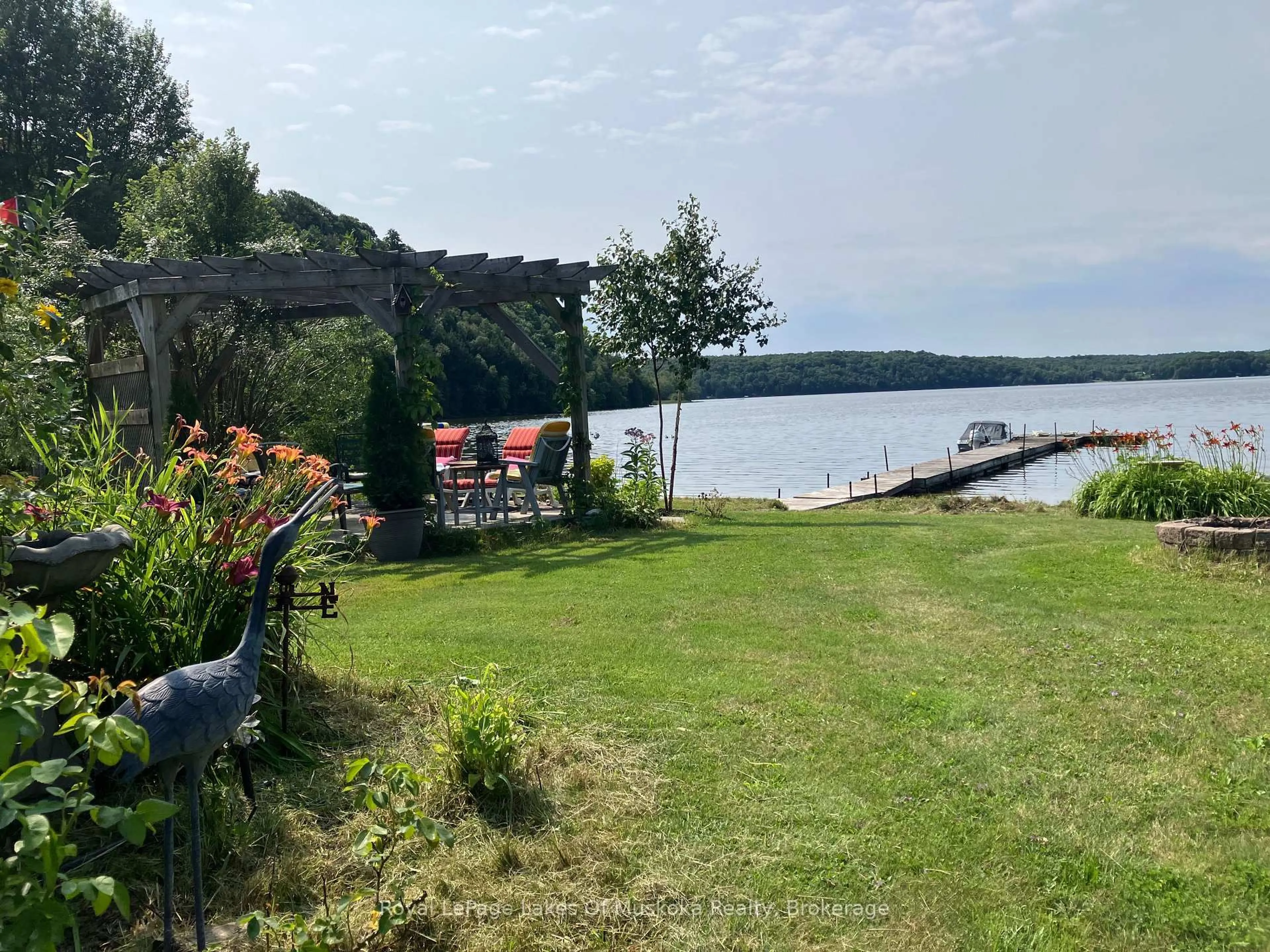 Patio, water/lake/river/ocean view for 1052 Cove Rd #1, Muskoka Lakes Ontario P0B 1M0