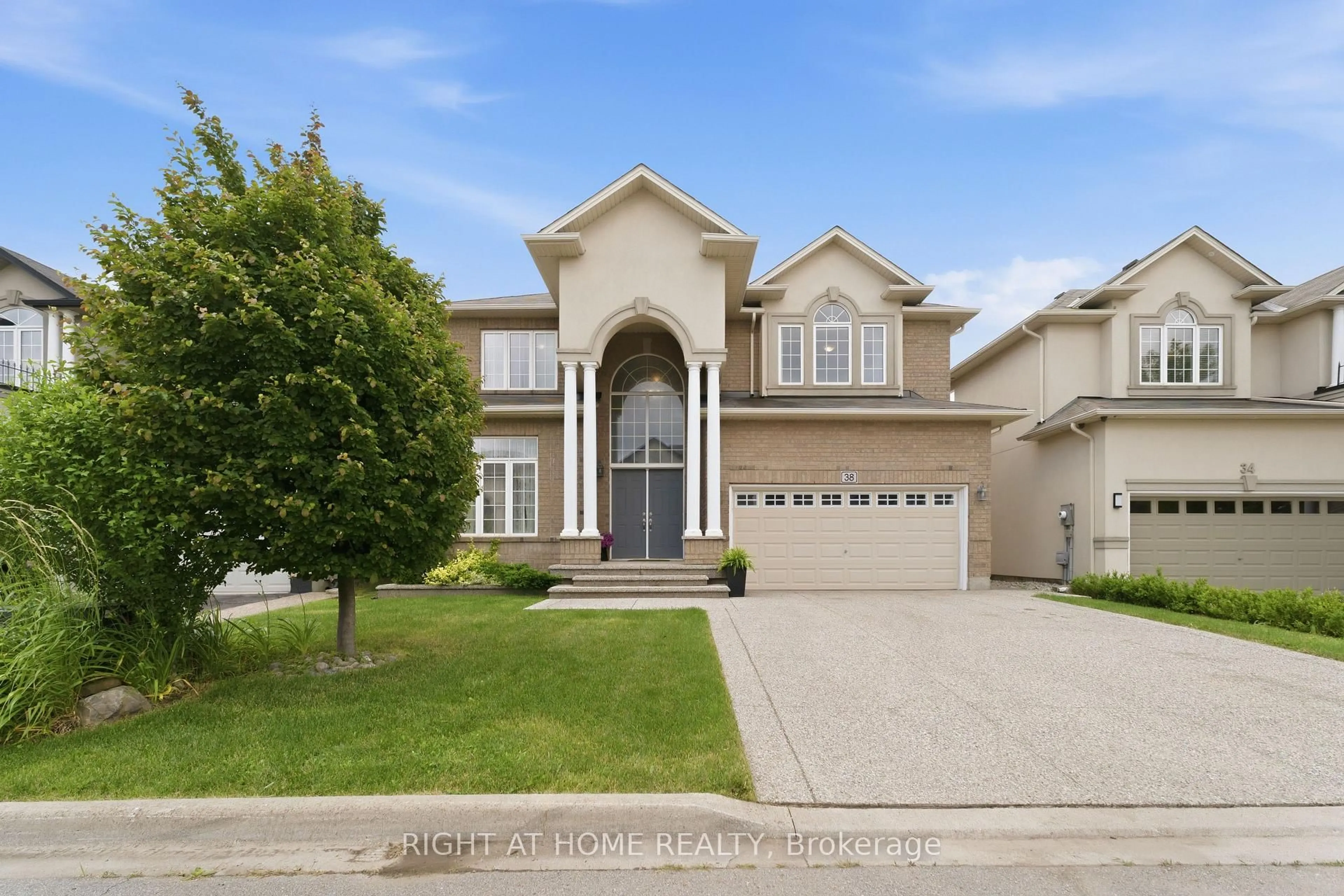 Home with vinyl exterior material, street for 38 Weaver Dr, Hamilton Ontario L9K 0G3
