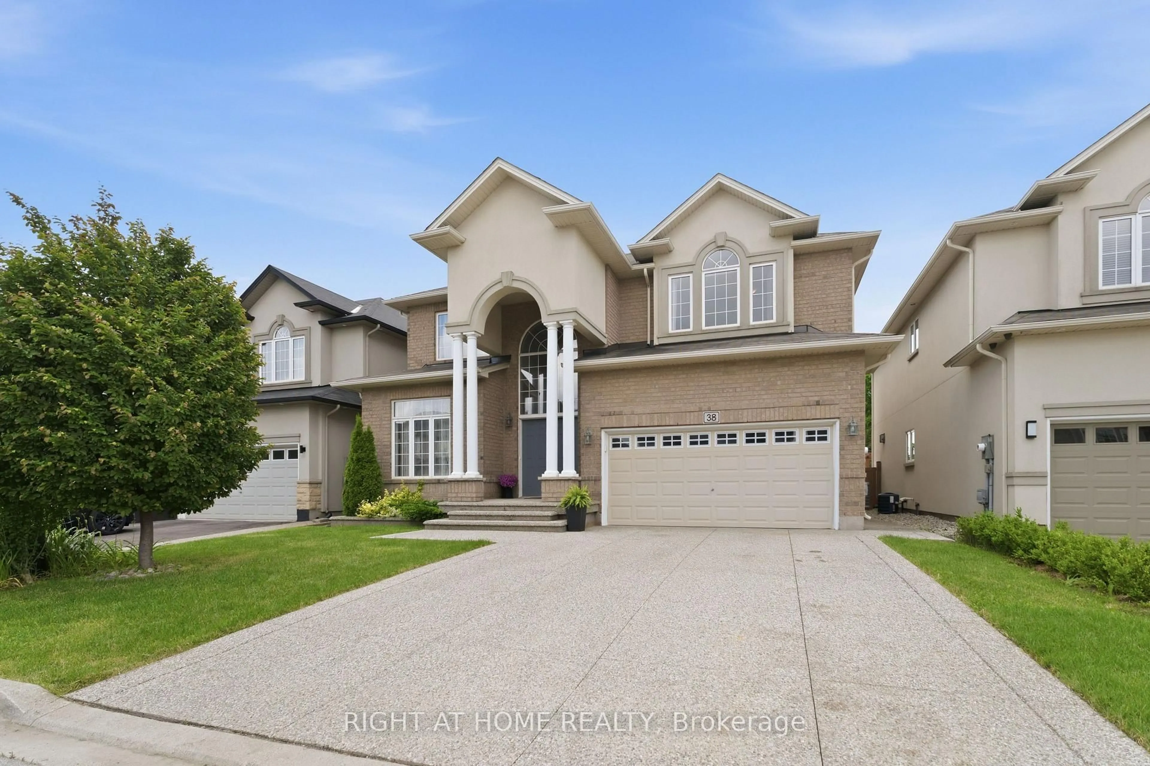 Home with vinyl exterior material, street for 38 Weaver Dr, Hamilton Ontario L9K 0G3