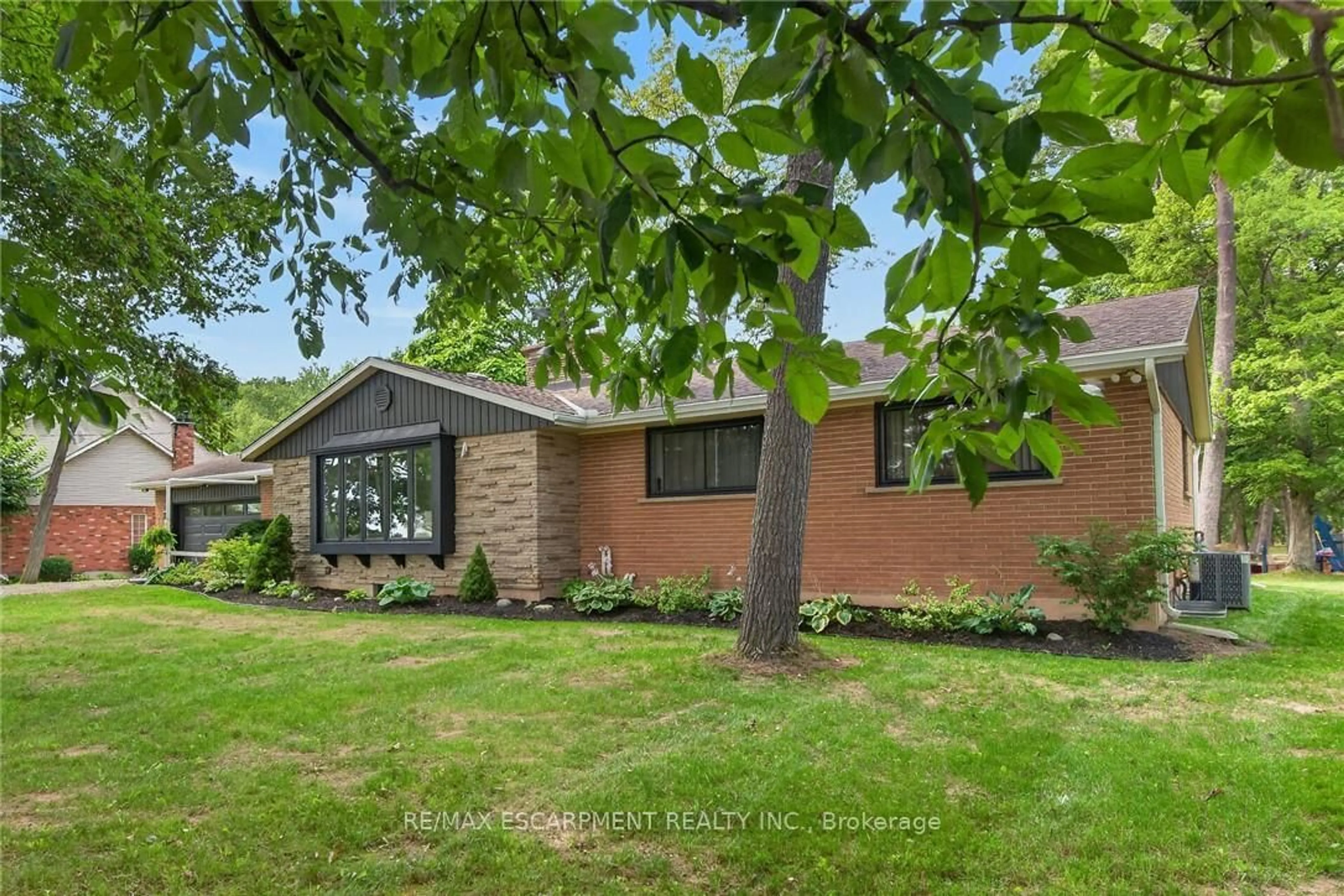 Home with brick exterior material, street for 7079 Rainham Rd, Haldimand Ontario N1A 2W8