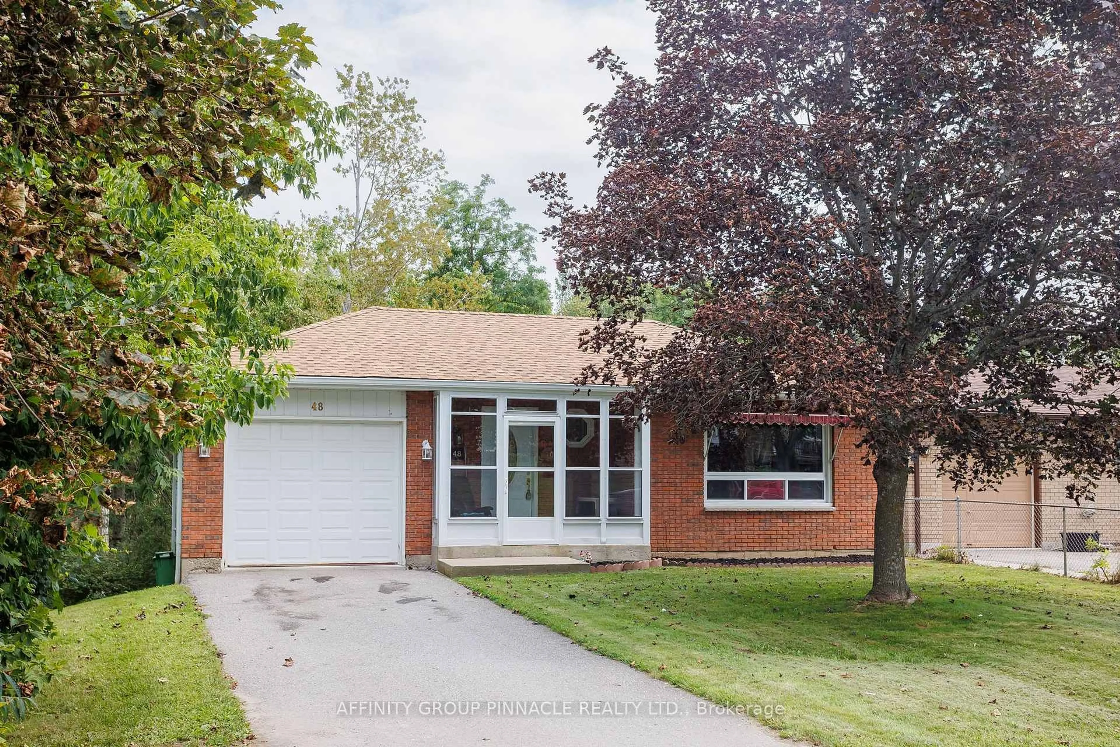 Home with brick exterior material, street for 48 Kennedy Dr, Kawartha Lakes Ontario K0M 1N0