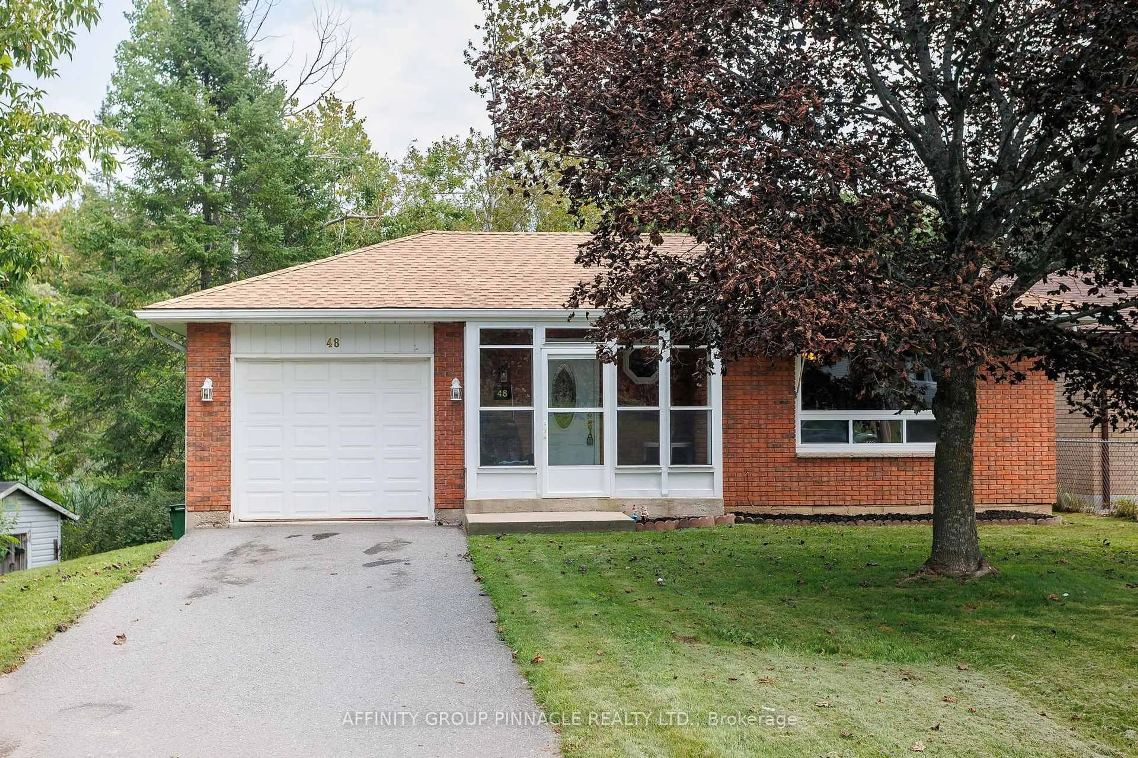Home with brick exterior material, street for 48 Kennedy Dr, Kawartha Lakes Ontario K0M 1N0