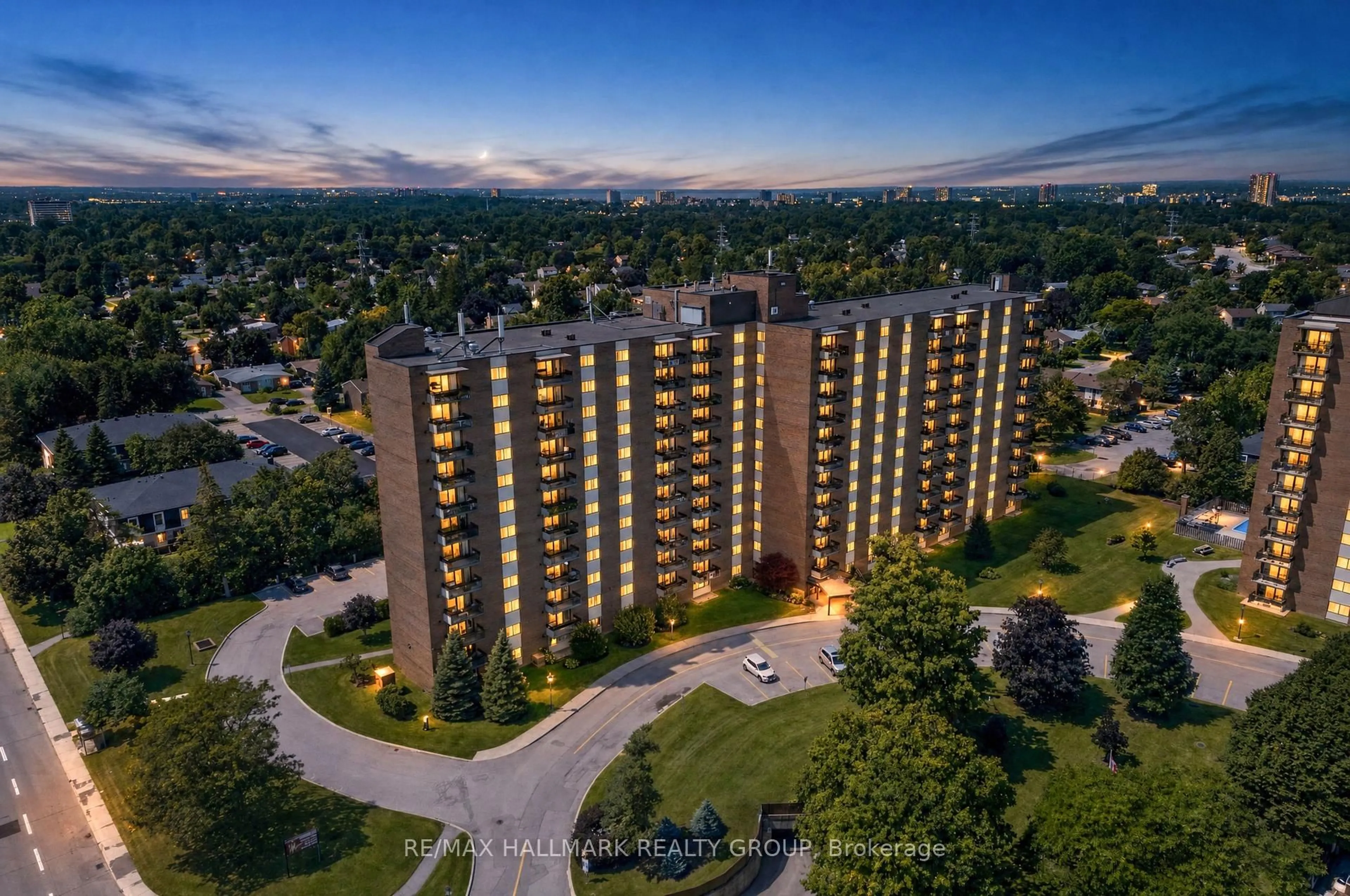 A pic from outside/outdoor area/front of a property/back of a property/a pic from drone, unknown for 1505 Baseline Rd #313, Ottawa Ontario K2C 3L4