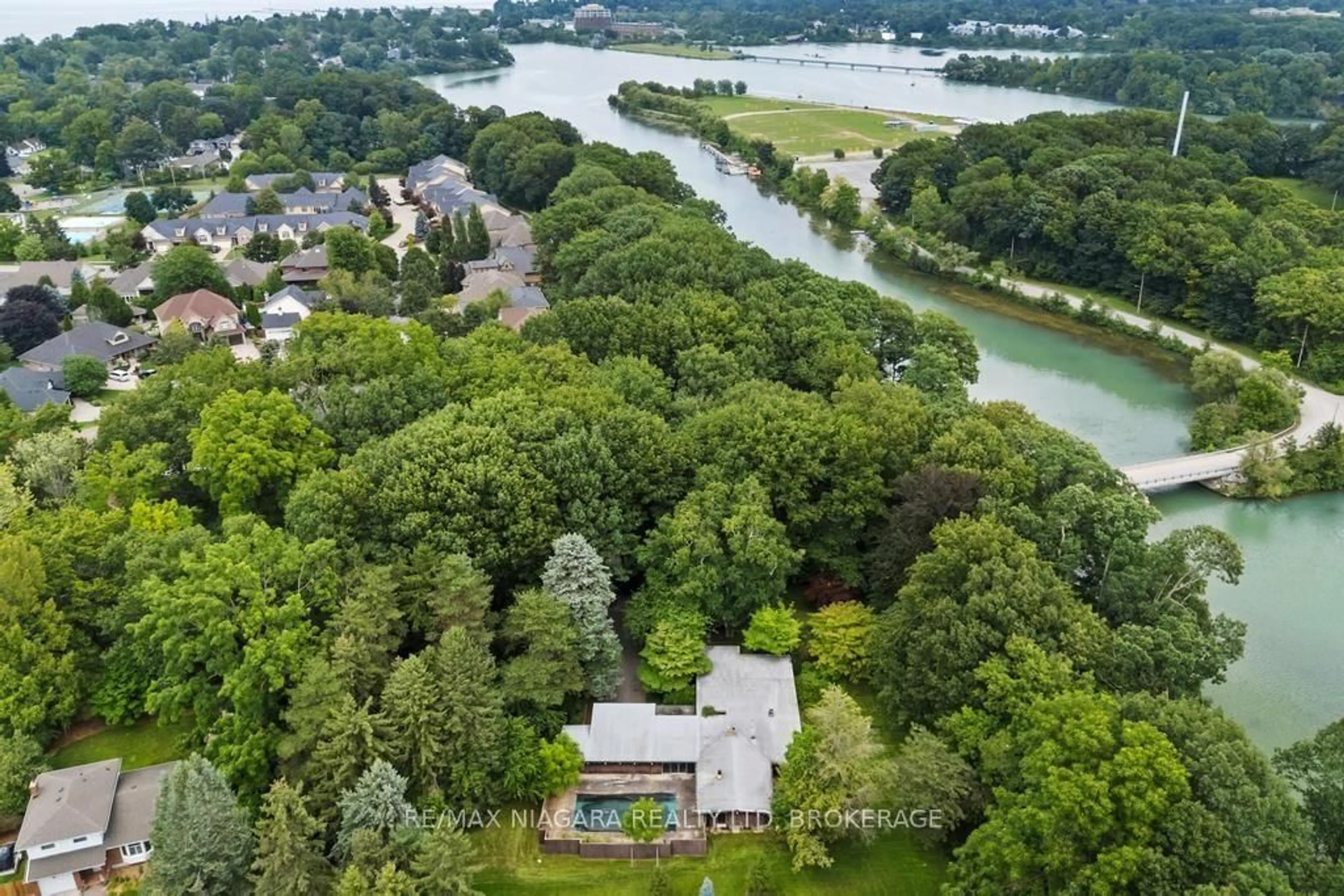 A pic from outside/outdoor area/front of a property/back of a property/a pic from drone, water/lake/river/ocean view for 45 Port Master Dr, St. Catharines Ontario L2N 6X3