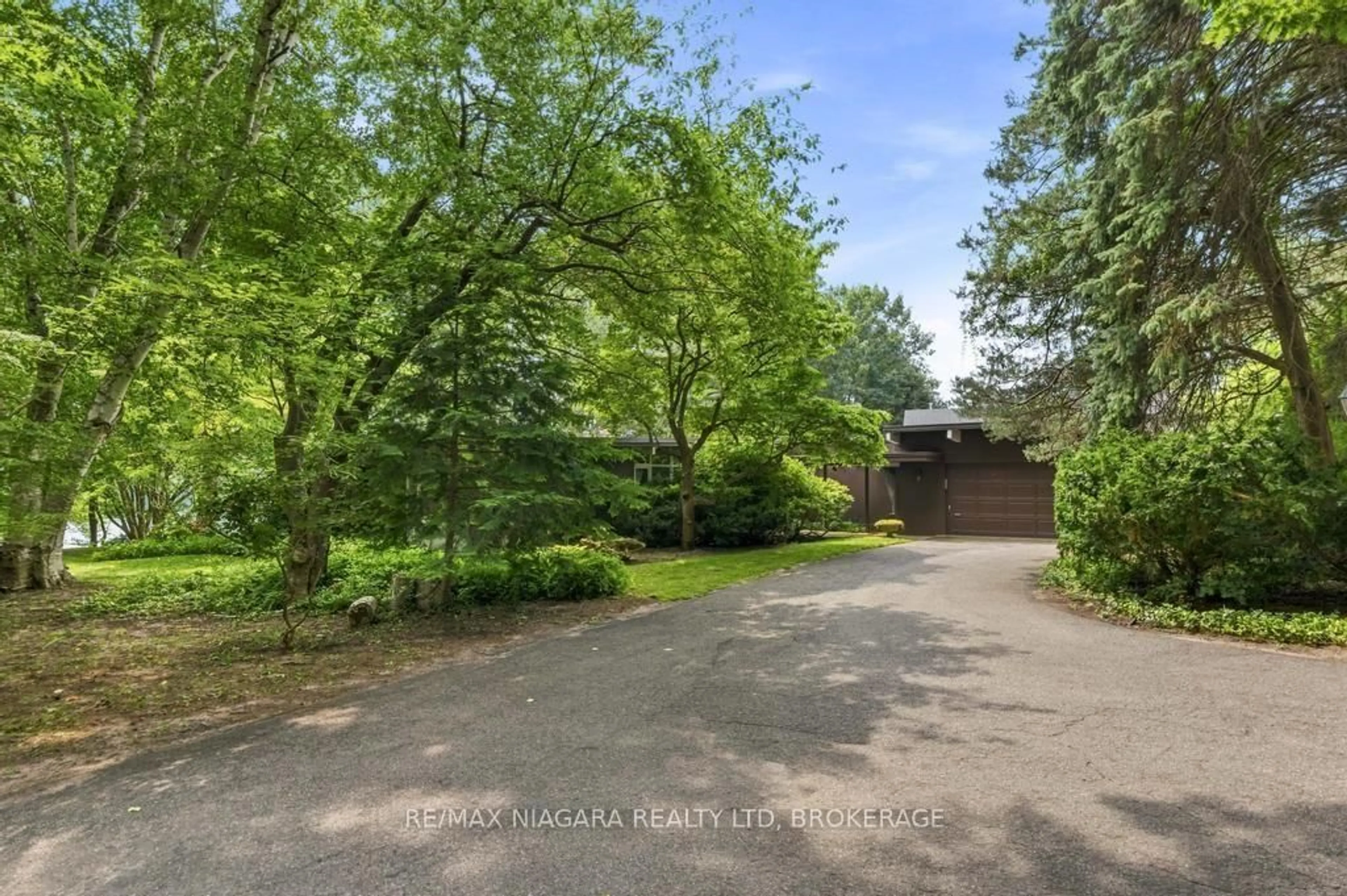 A pic from outside/outdoor area/front of a property/back of a property/a pic from drone, forest/trees view for 45 Port Master Dr, St. Catharines Ontario L2N 6X3