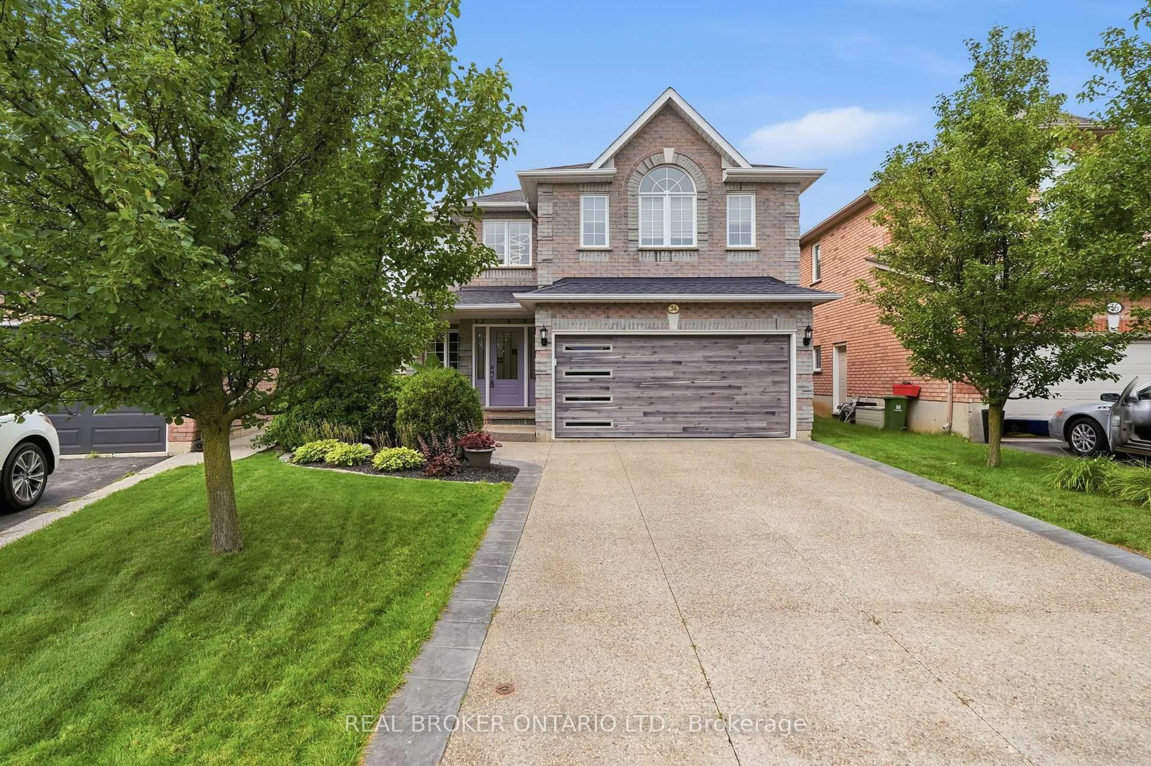 Home with brick exterior material, street for 34 Keewaydin St, Hamilton Ontario L0R 2H6