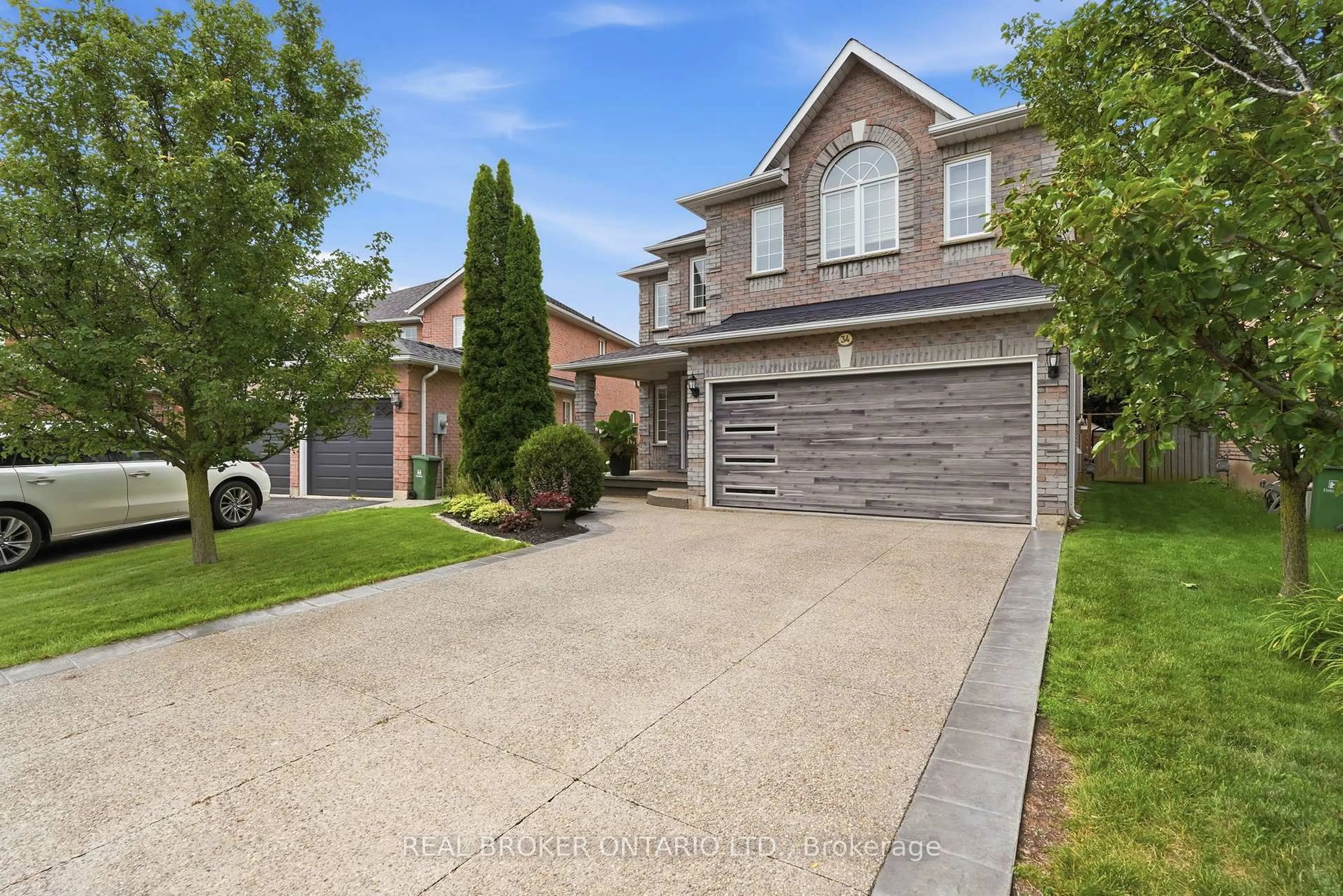 Home with brick exterior material, street for 34 Keewaydin St, Hamilton Ontario L0R 2H6