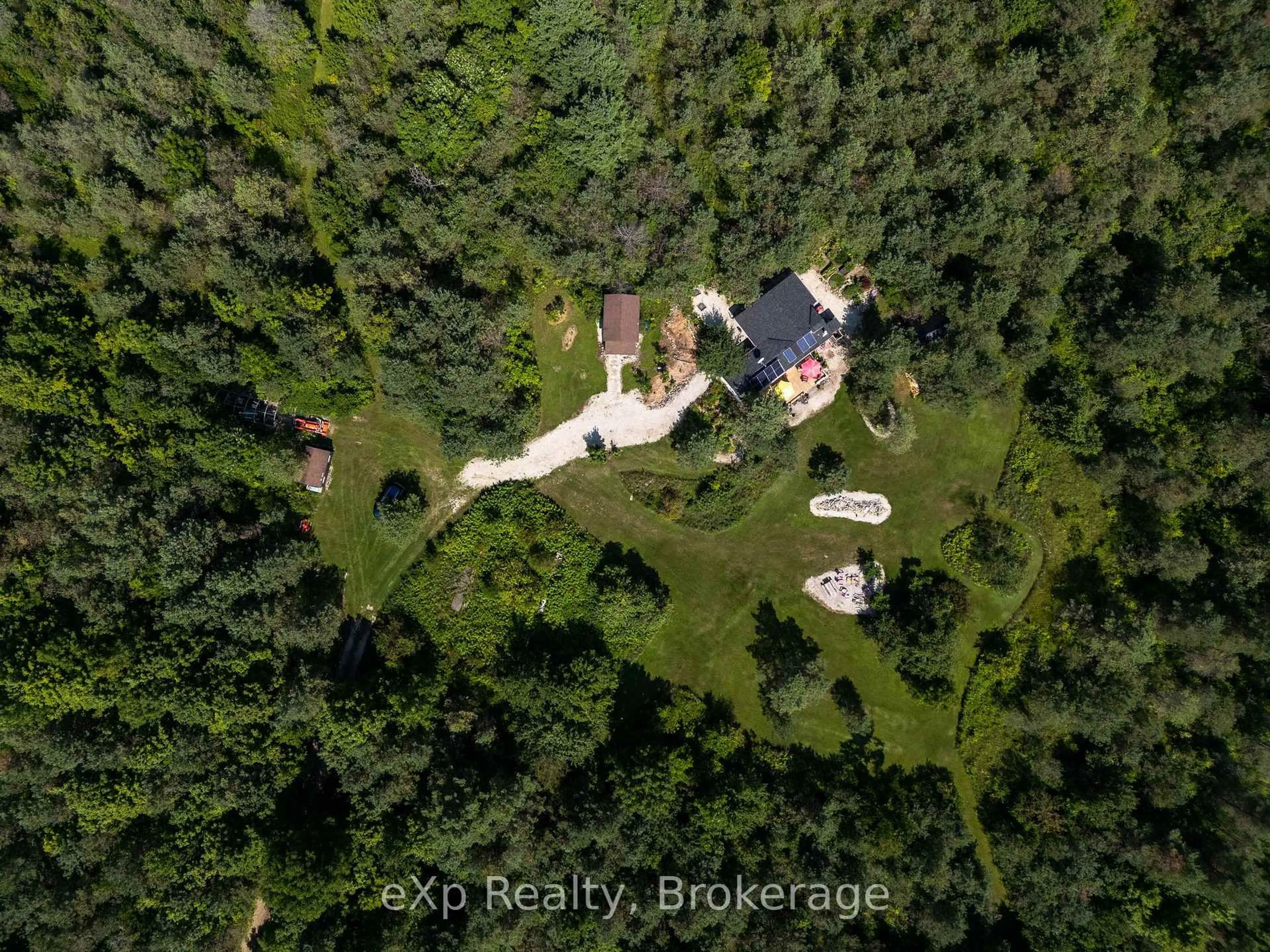 A pic from outside/outdoor area/front of a property/back of a property/a pic from drone, forest/trees view for 174745 Mulock Rd, West Grey Ontario N0G 1S0