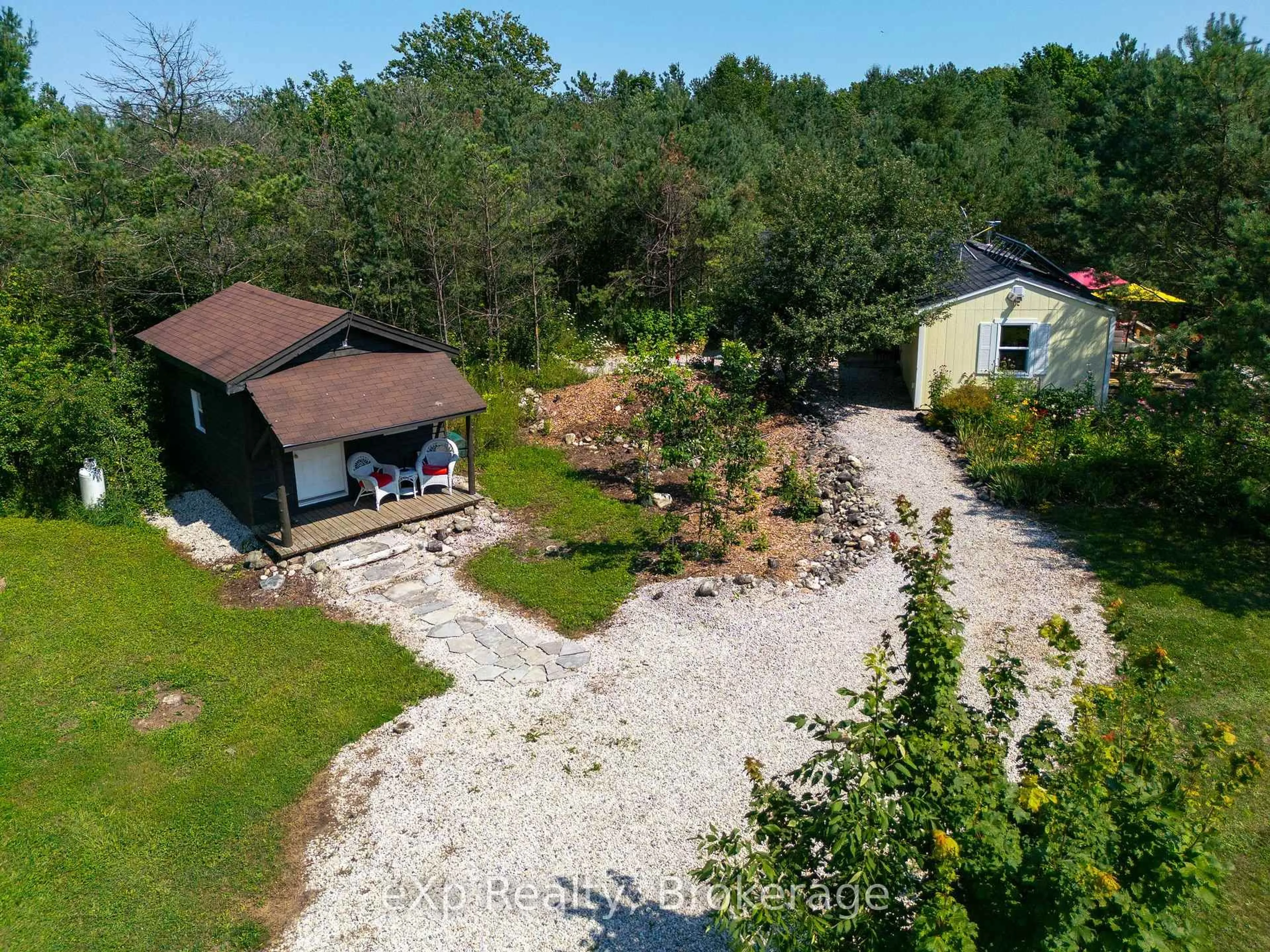 A pic from outside/outdoor area/front of a property/back of a property/a pic from drone, unknown for 174745 Mulock Rd, West Grey Ontario N0G 1S0