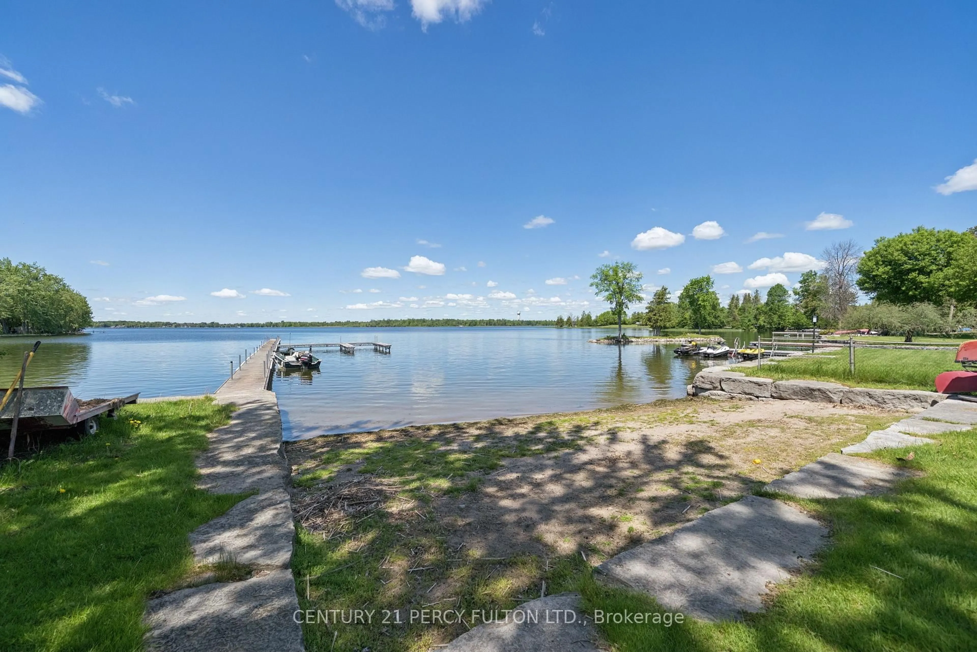 A pic from outside/outdoor area/front of a property/back of a property/a pic from drone, water/lake/river/ocean view for 1935 Pratt's Marina Rd, Selwyn Ontario K0L 2H0