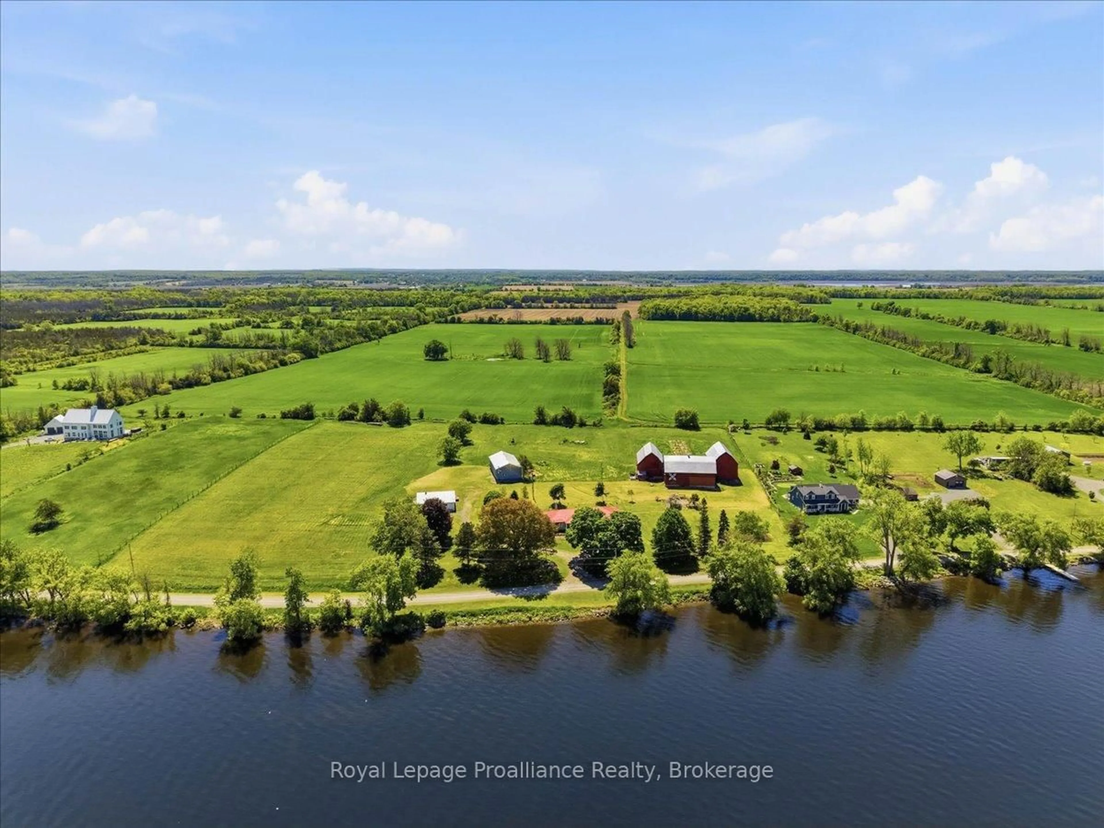 A pic from outside/outdoor area/front of a property/back of a property/a pic from drone, water/lake/river/ocean view for 906 N Big Island Rd, Prince Edward County Ontario K0K 1W0