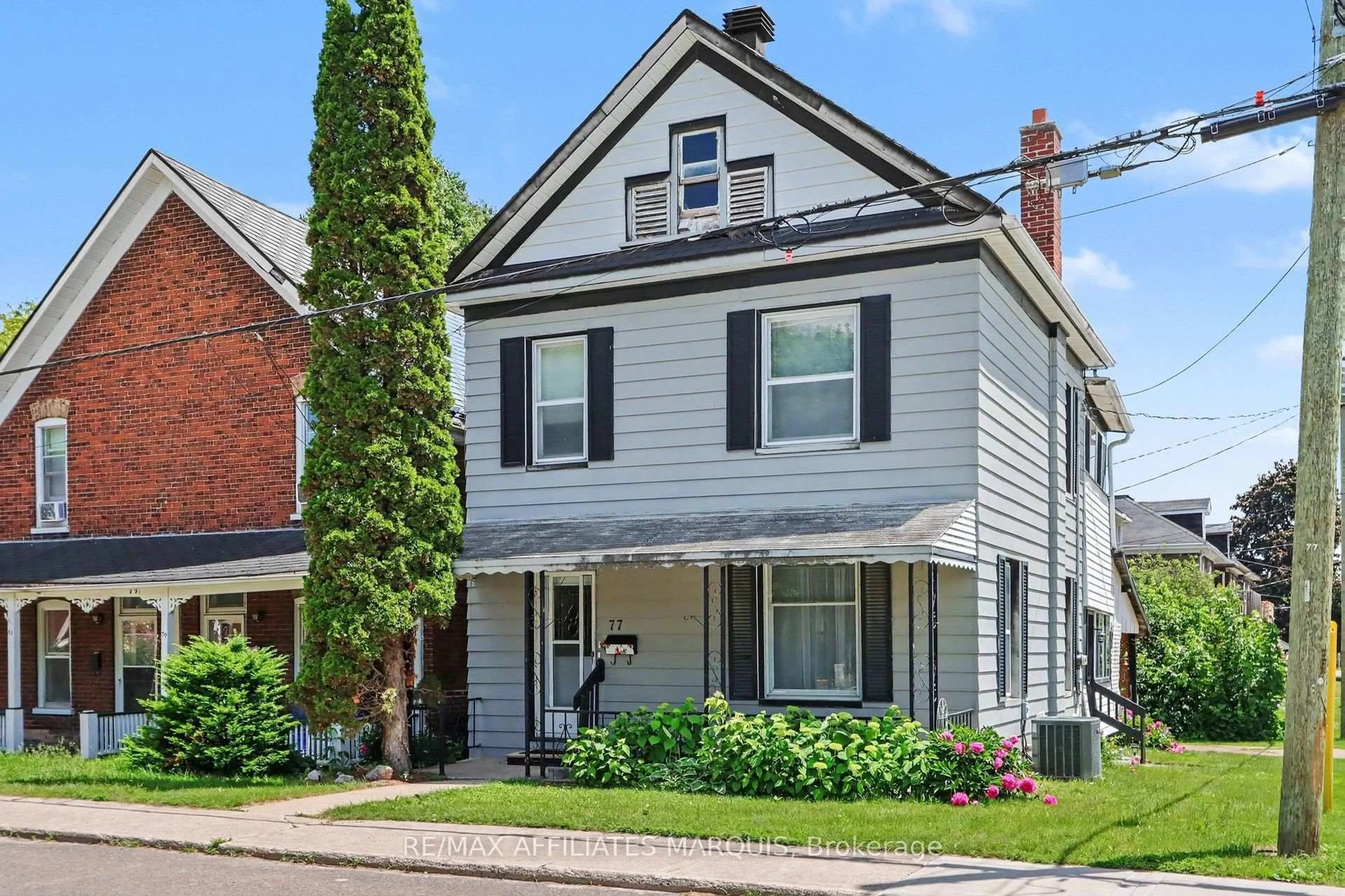 Home with brick exterior material, street for 77 Russell St, Smiths Falls Ontario K7A 1G8