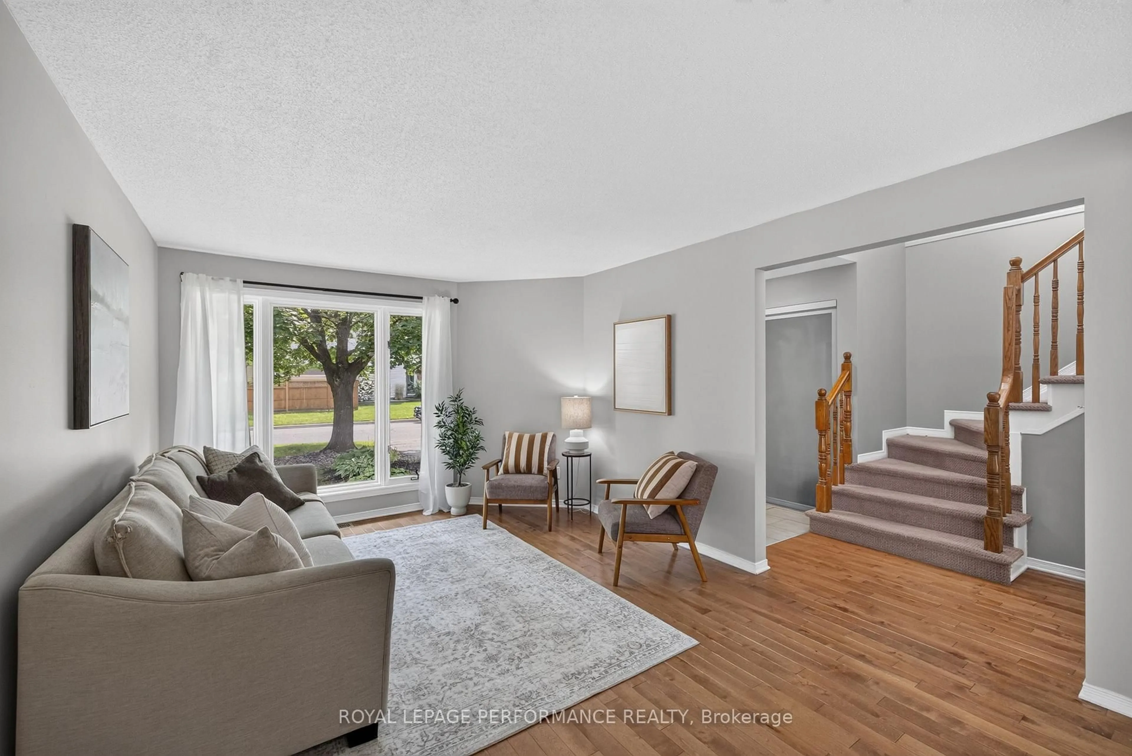 Living room with furniture, unknown for 1720 Bellechasse Pl, Orleans Ontario K1C 6W3