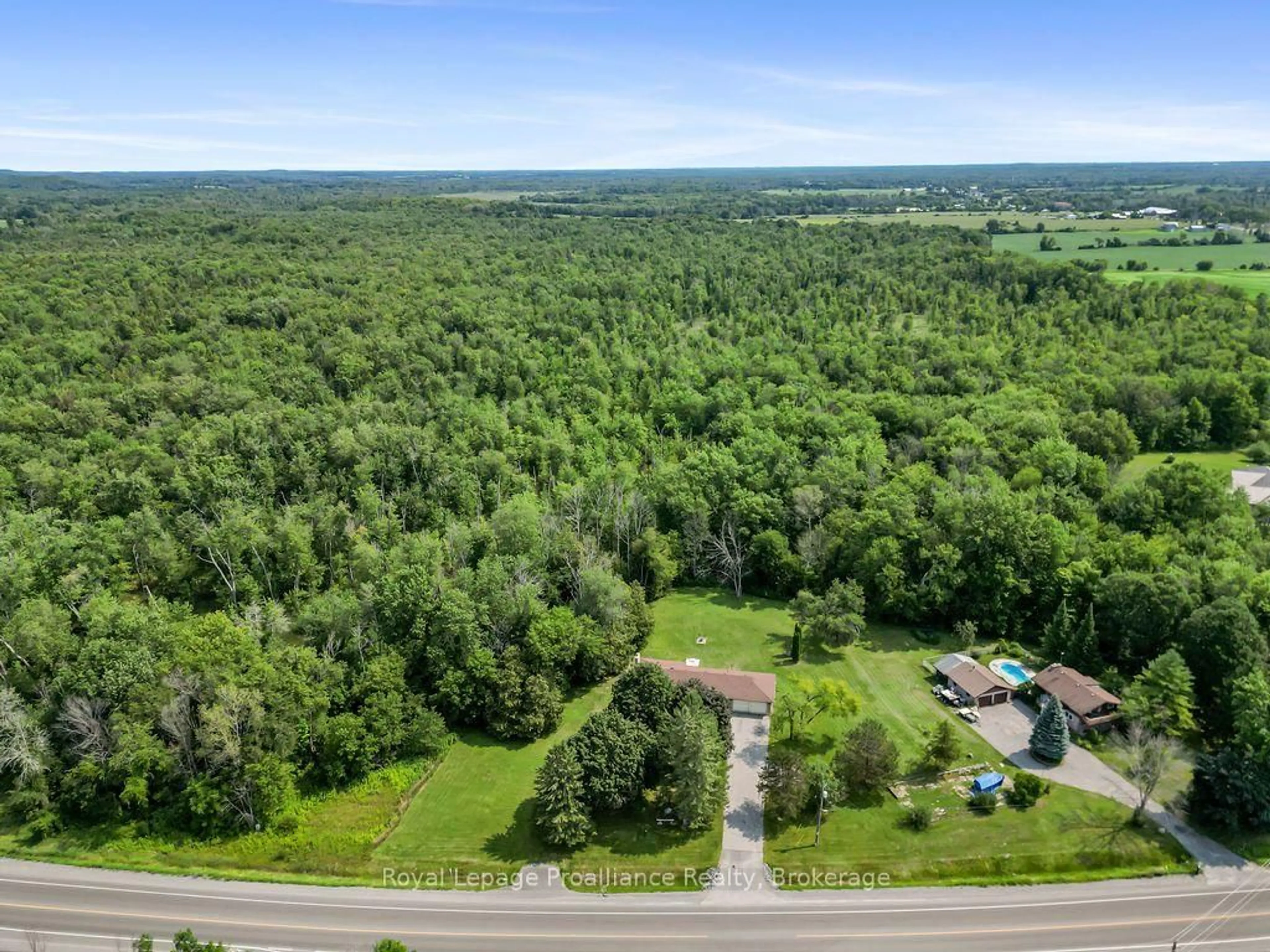 A pic from outside/outdoor area/front of a property/back of a property/a pic from drone, forest/trees view for 794 Foxboro Stirling Rd, Quinte West Ontario K0K 2B0