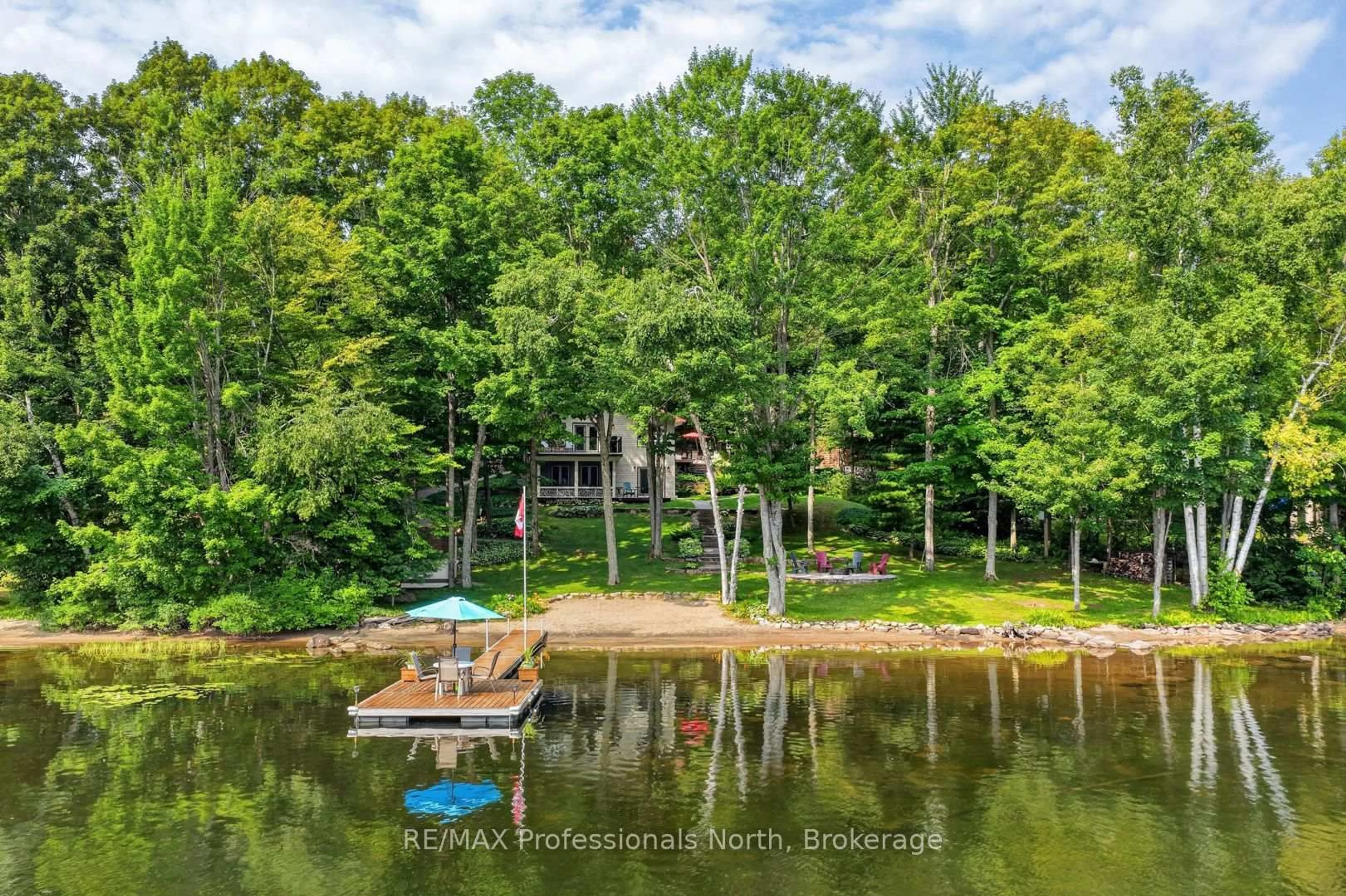 A pic from outside/outdoor area/front of a property/back of a property/a pic from drone, water/lake/river/ocean view for 1208 Little Bob Lake Rd, Minden Hills Ontario K0M 2K0