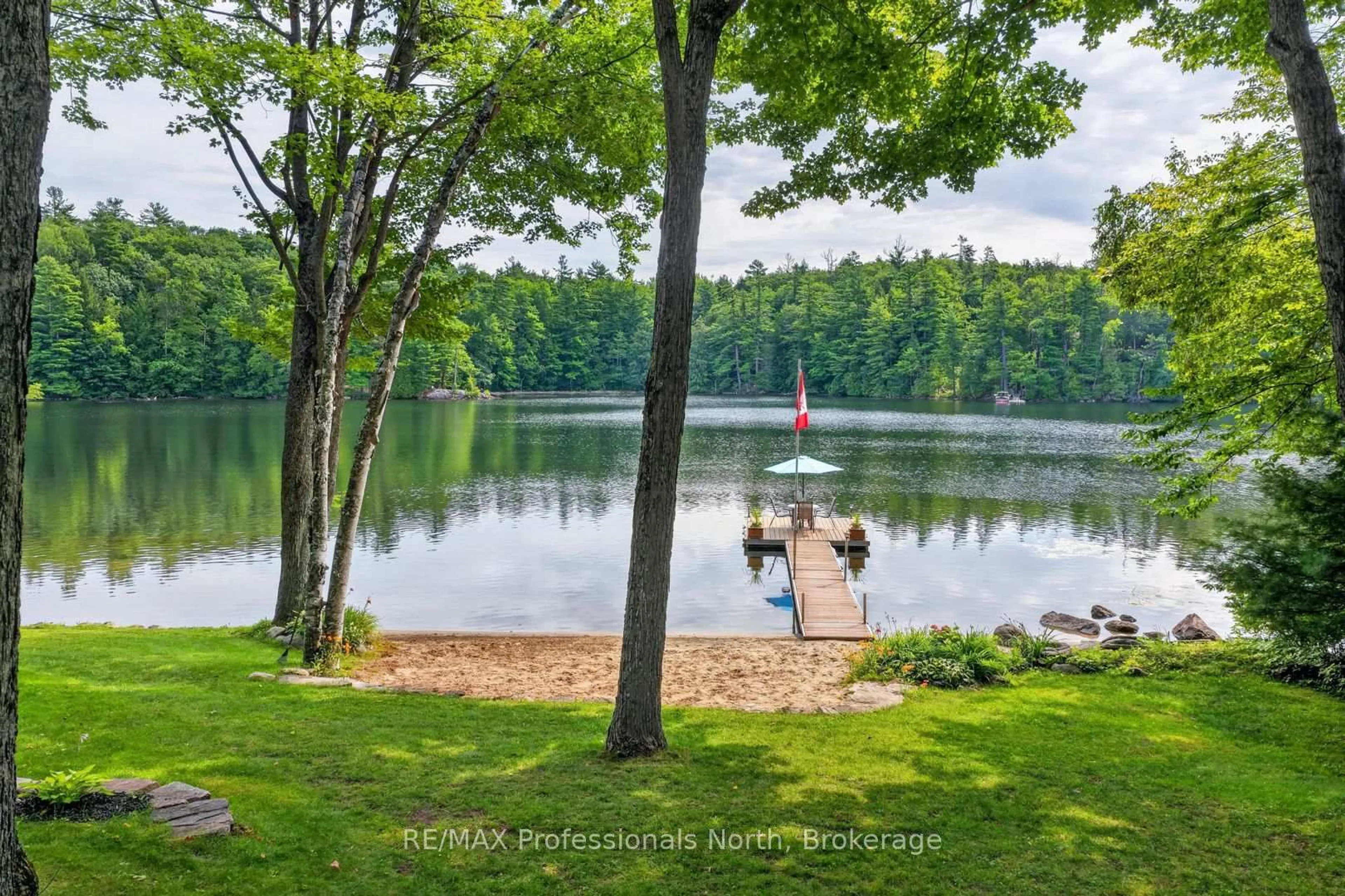 A pic from outside/outdoor area/front of a property/back of a property/a pic from drone, water/lake/river/ocean view for 1208 Little Bob Lake Rd, Minden Hills Ontario K0M 2K0