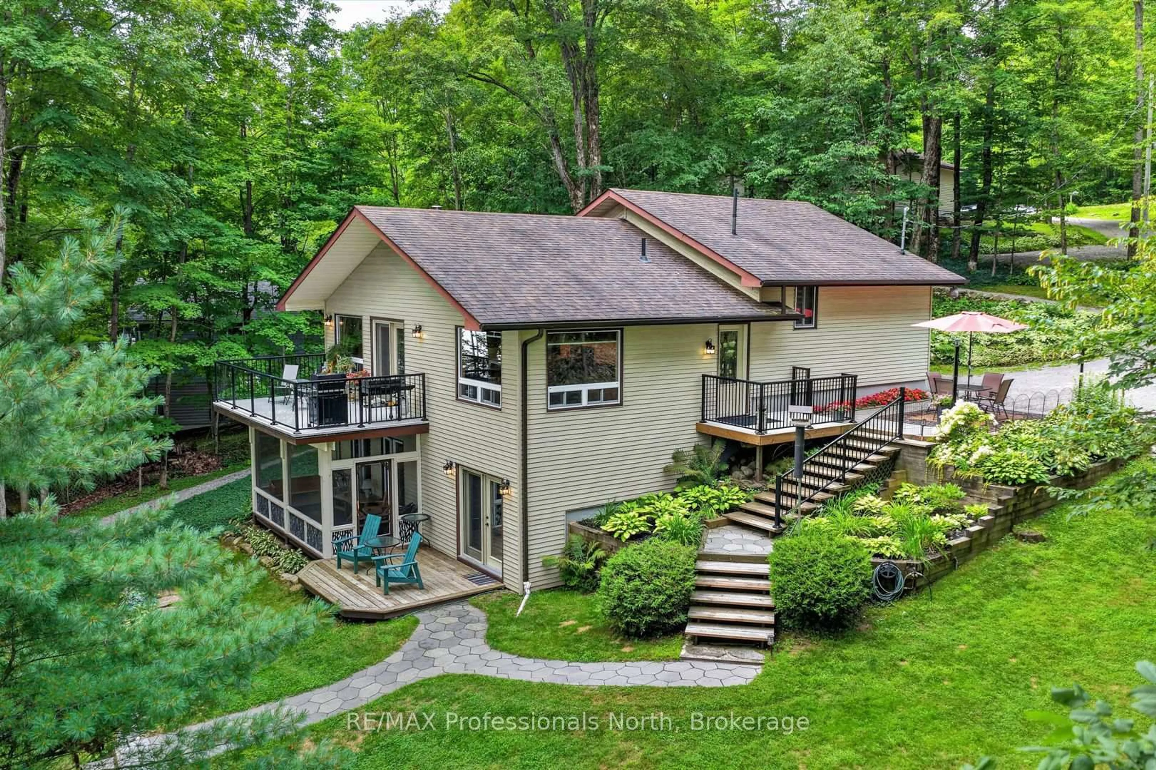 A pic from outside/outdoor area/front of a property/back of a property/a pic from drone, water/lake/river/ocean view for 1208 Little Bob Lake Rd, Minden Hills Ontario K0M 2K0