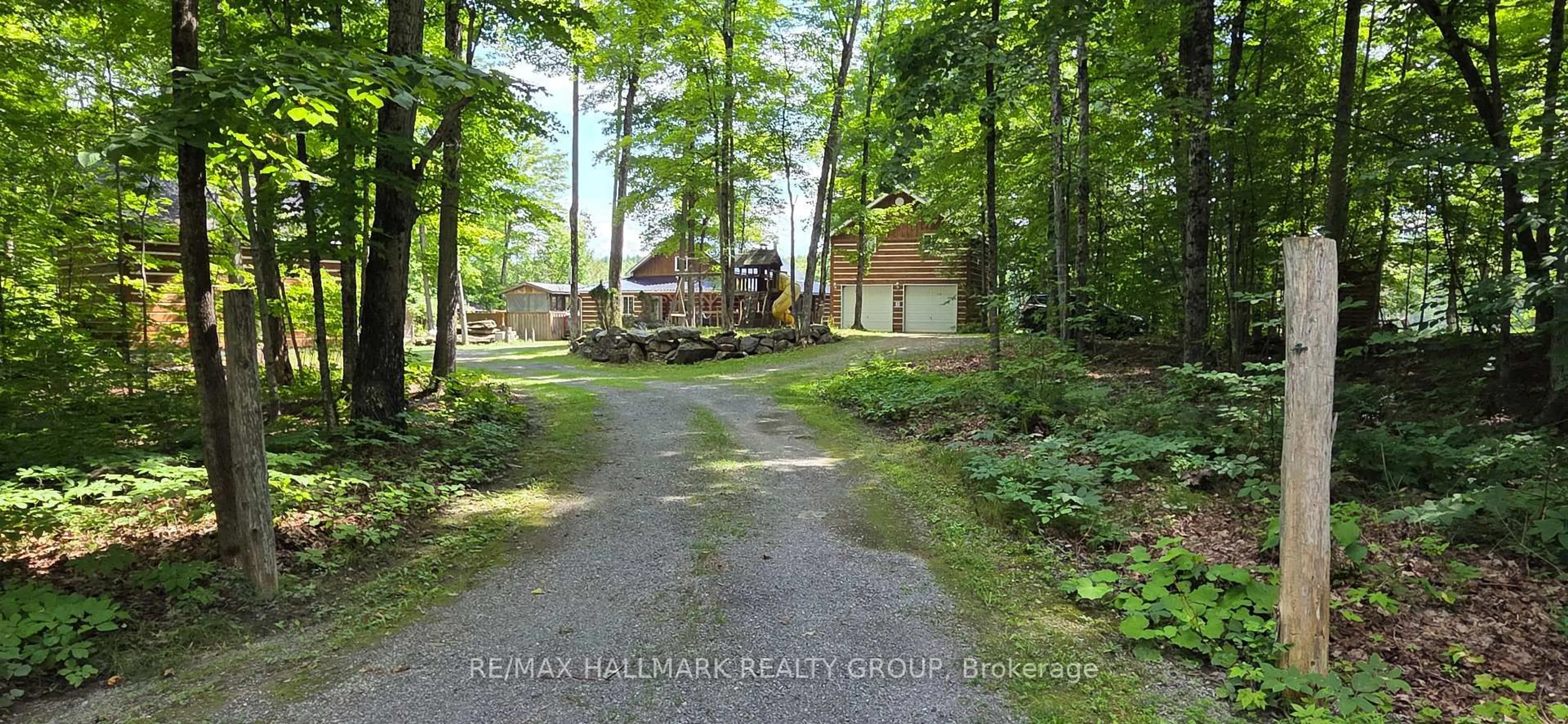 A pic from outside/outdoor area/front of a property/back of a property/a pic from drone, forest/trees view for 261 Lacourse Lane, White Lake Ontario K0A 3L0