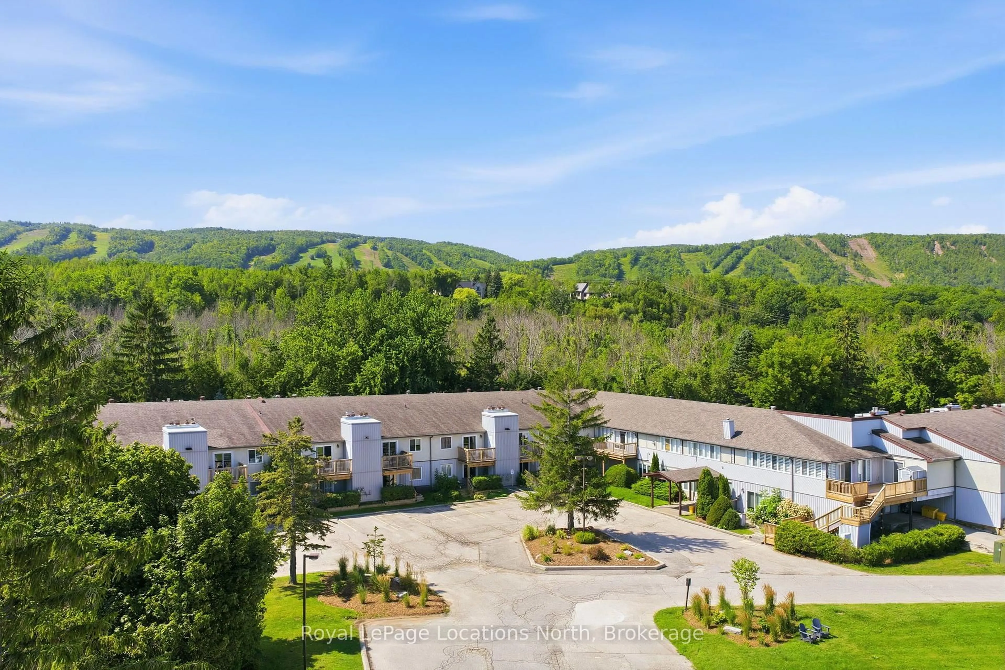 A pic from outside/outdoor area/front of a property/back of a property/a pic from drone, mountain view for 209472 Highway 26 Highway #25, Blue Mountains Ontario L9Y 0V3