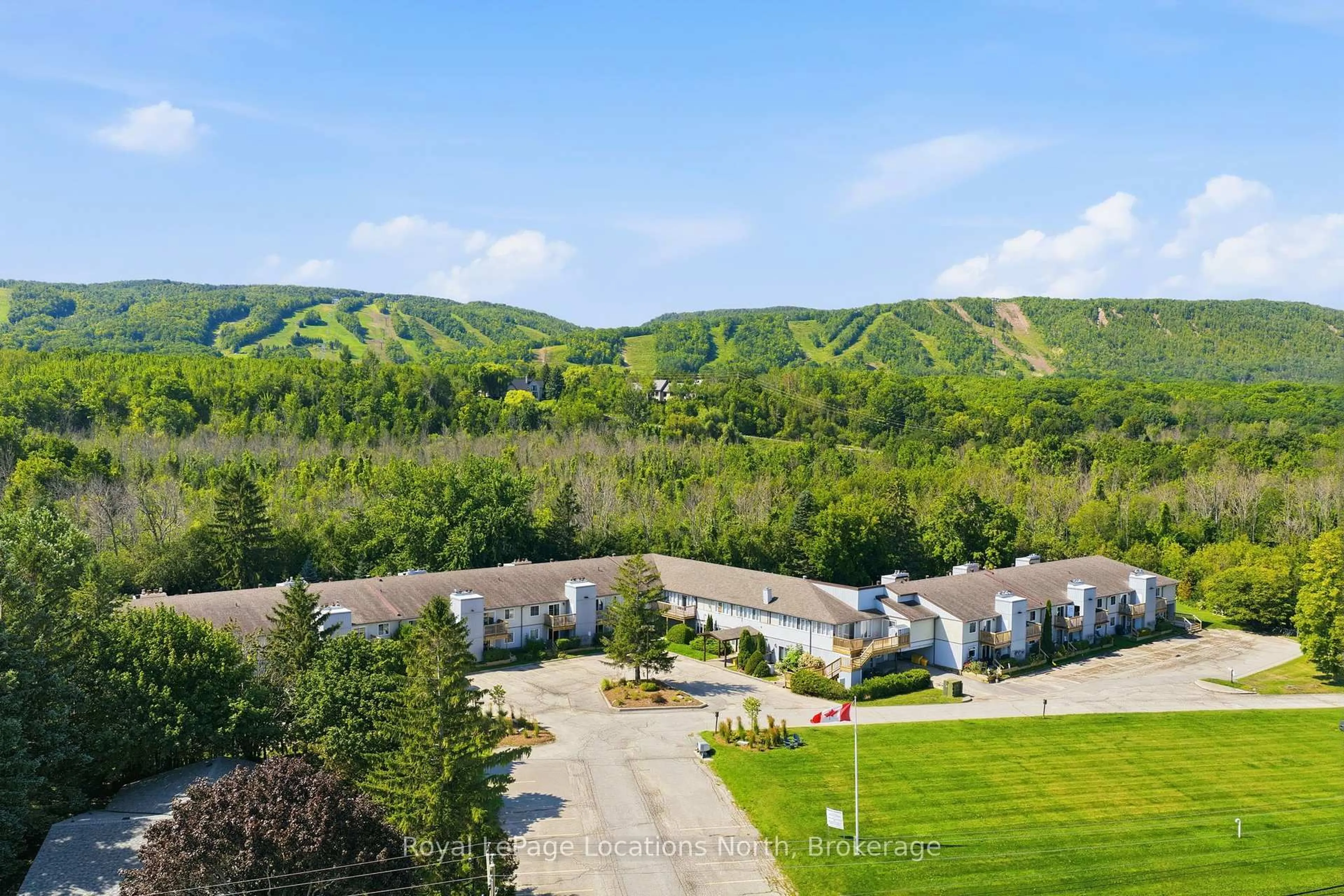 A pic from outside/outdoor area/front of a property/back of a property/a pic from drone, mountain view for 209472 Highway 26 Highway #25, Blue Mountains Ontario L9Y 0V3