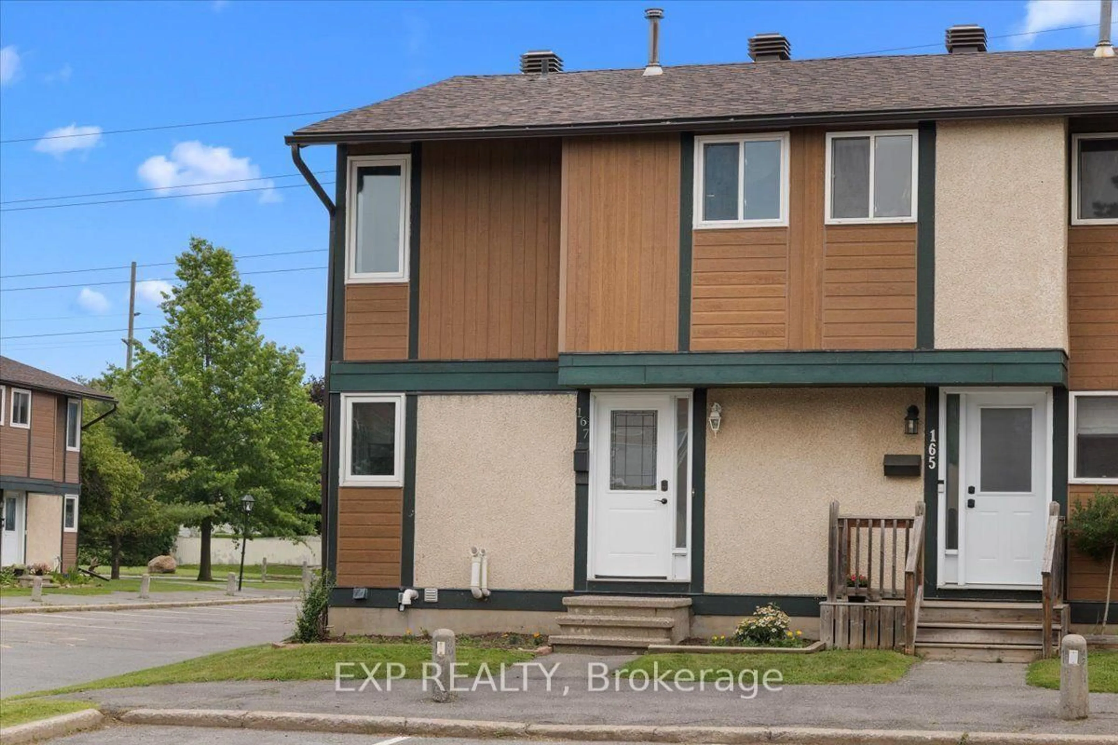 A pic from outside/outdoor area/front of a property/back of a property/a pic from drone, street for 1449 Ridgebrook Dr #167, Ottawa Ontario K1B 4T1