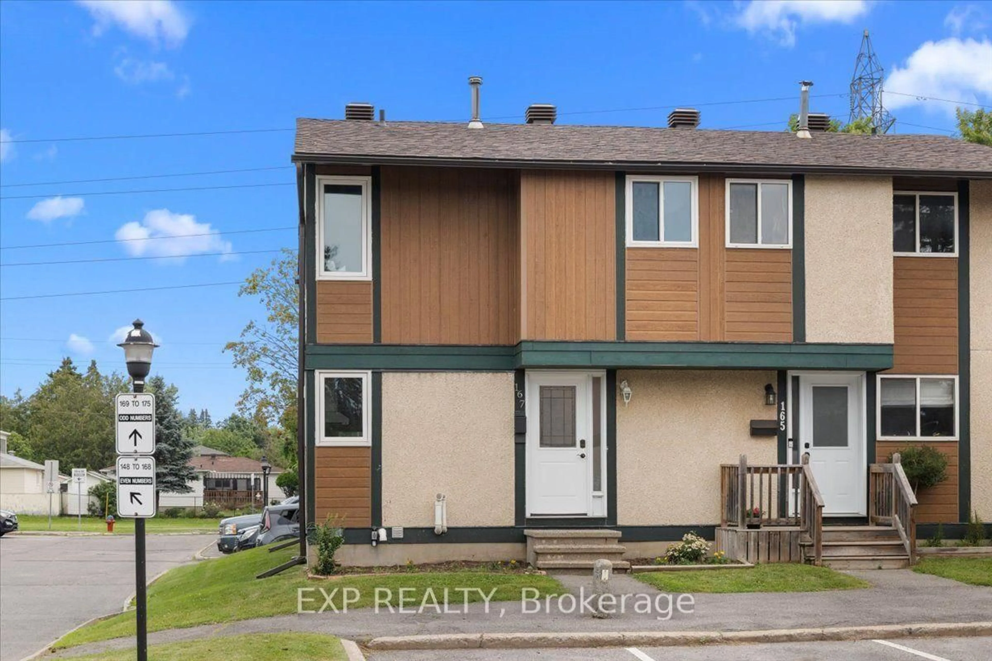 Home with vinyl exterior material, street for 1449 Ridgebrook Dr #167, Ottawa Ontario K1B 4T1