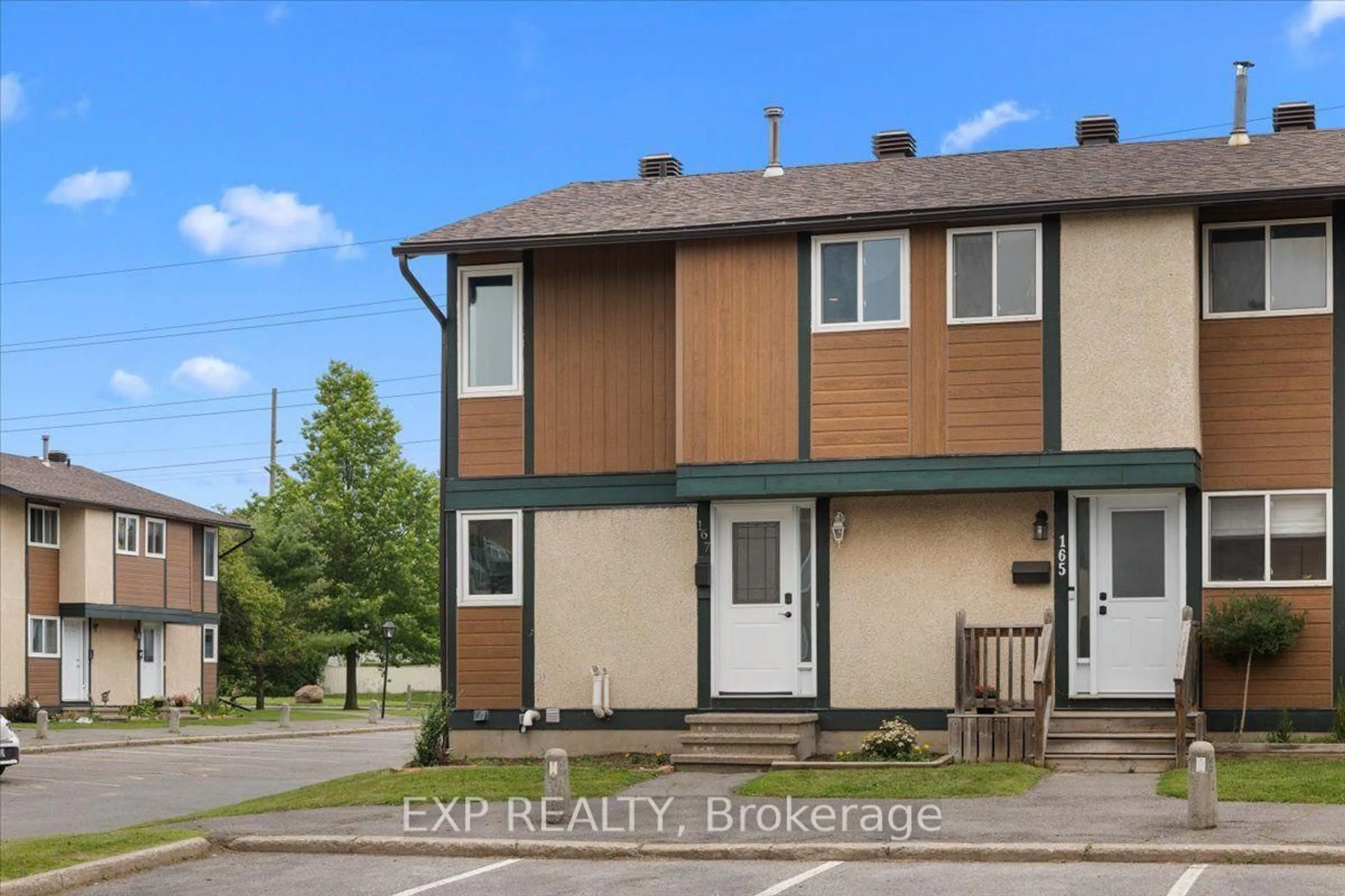 A pic from outside/outdoor area/front of a property/back of a property/a pic from drone, street for 1449 Ridgebrook Dr #167, Ottawa Ontario K1B 4T1