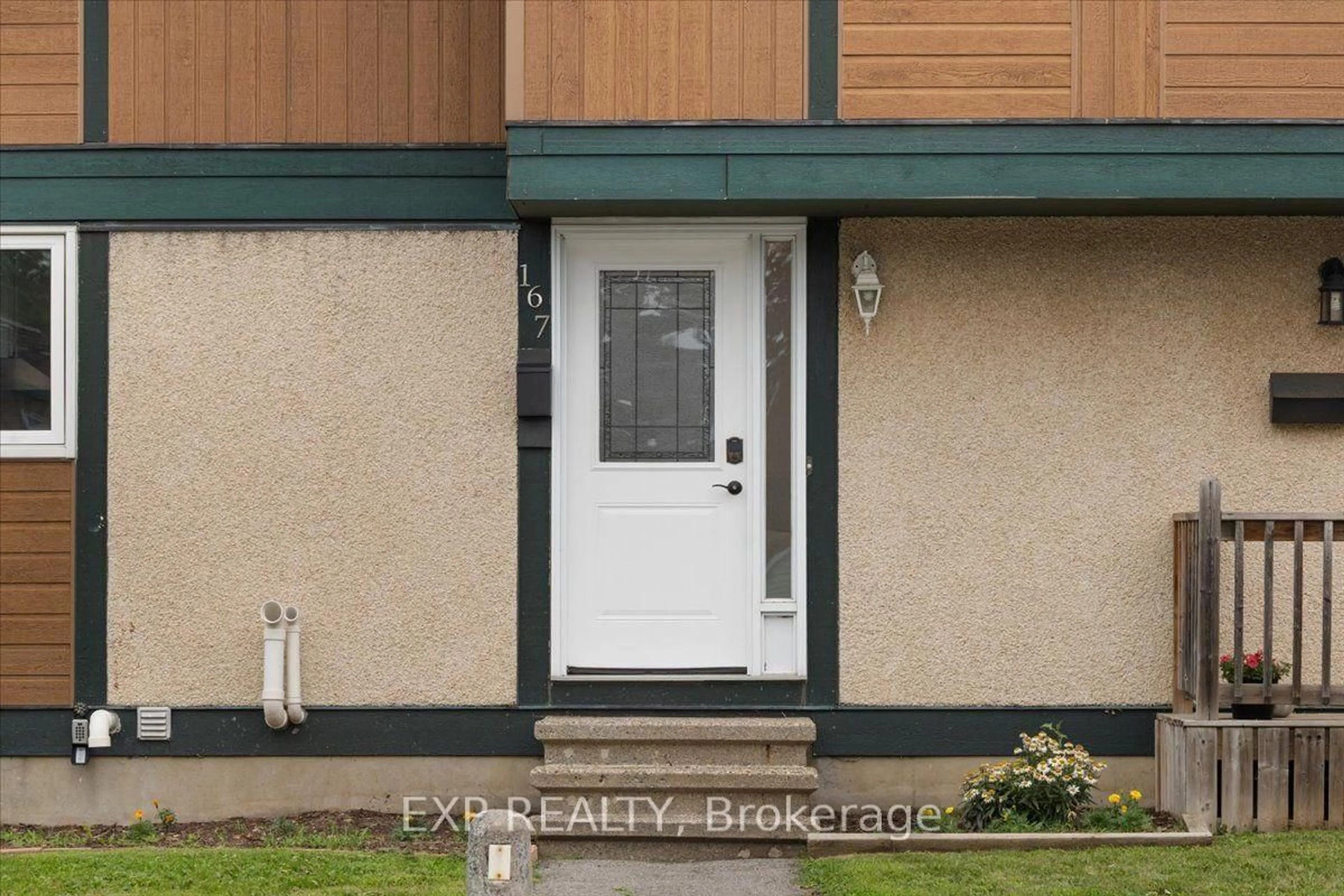 Home with vinyl exterior material, street for 1449 Ridgebrook Dr #167, Ottawa Ontario K1B 4T1