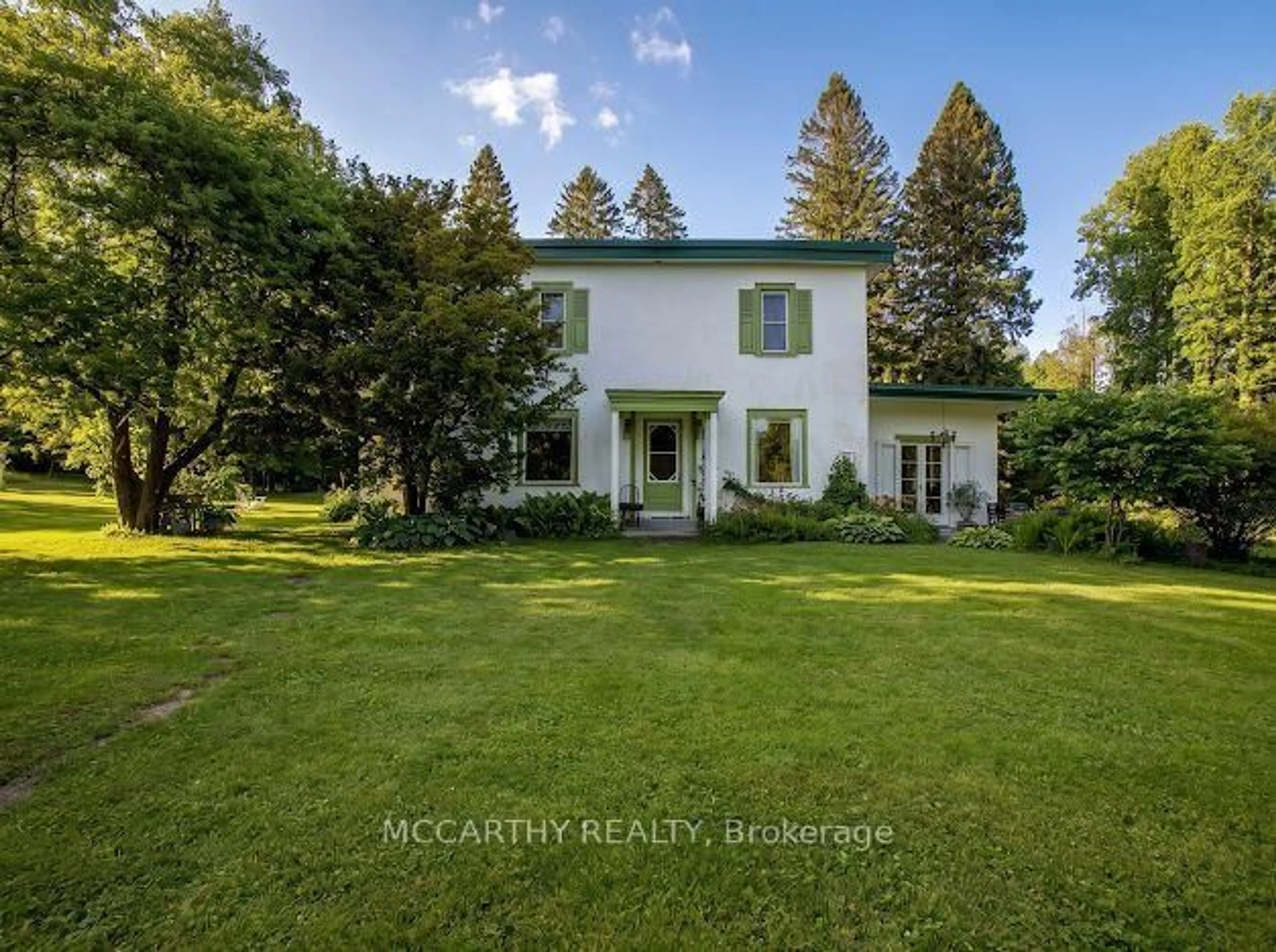 A pic from outside/outdoor area/front of a property/back of a property/a pic from drone, mountain view for 315119 Highway 6 Highway, West Grey Ontario N0G 1R0