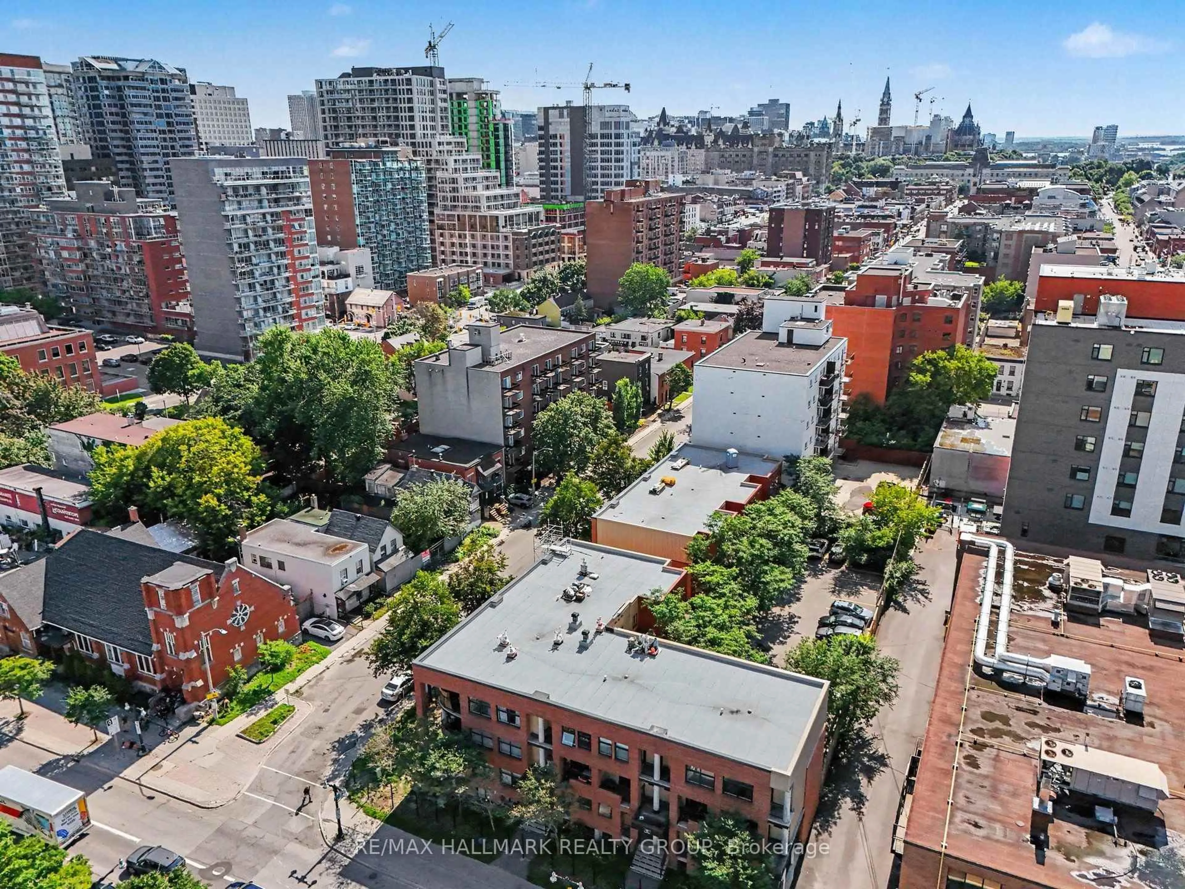 A pic from outside/outdoor area/front of a property/back of a property/a pic from drone, city buildings view from balcony for 260 King Edward Ave, Ottawa Ontario K1N 7M1