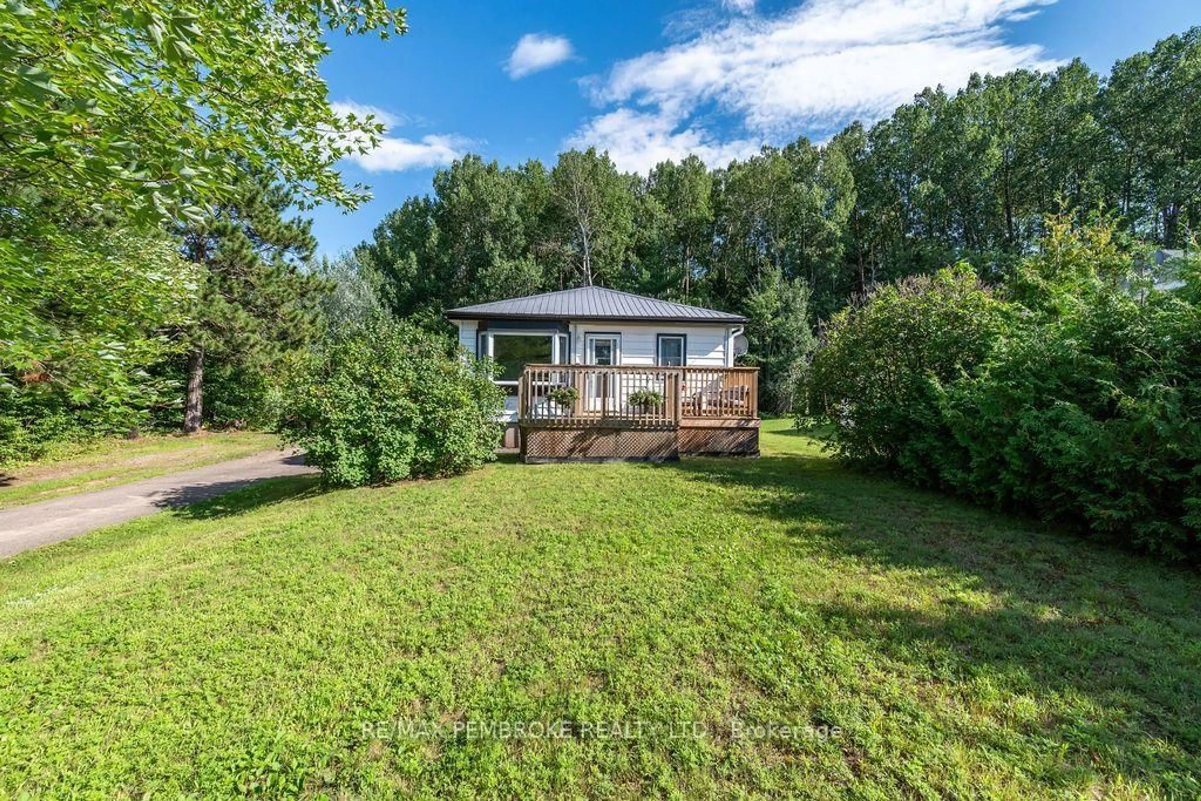 A pic from outside/outdoor area/front of a property/back of a property/a pic from drone, water/lake/river/ocean view for 1 New St, Petawawa Ontario K8H 2H4