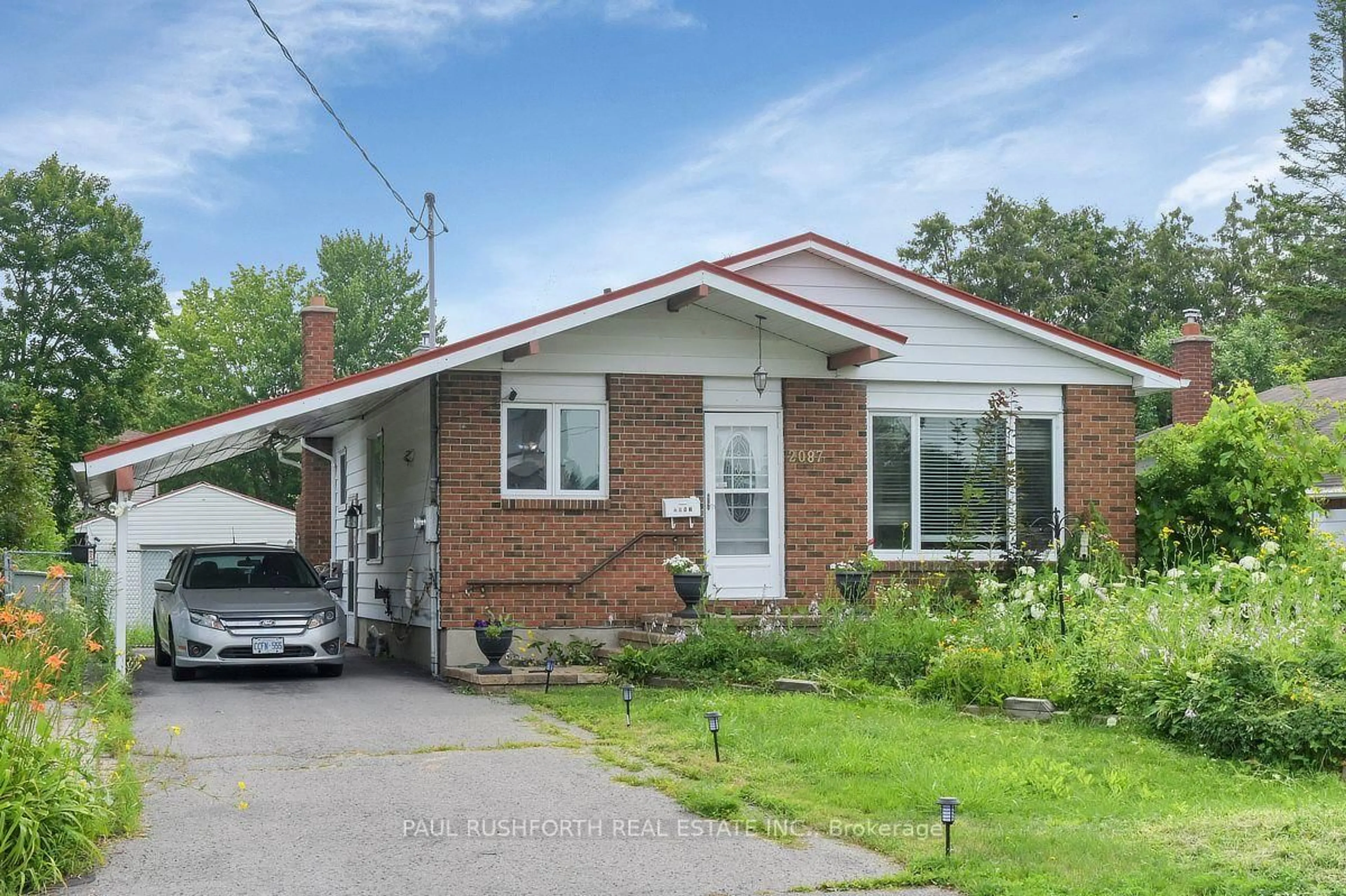 Home with brick exterior material, street for 2087 Boyer Rd, Orleans Ontario K1C 1R5