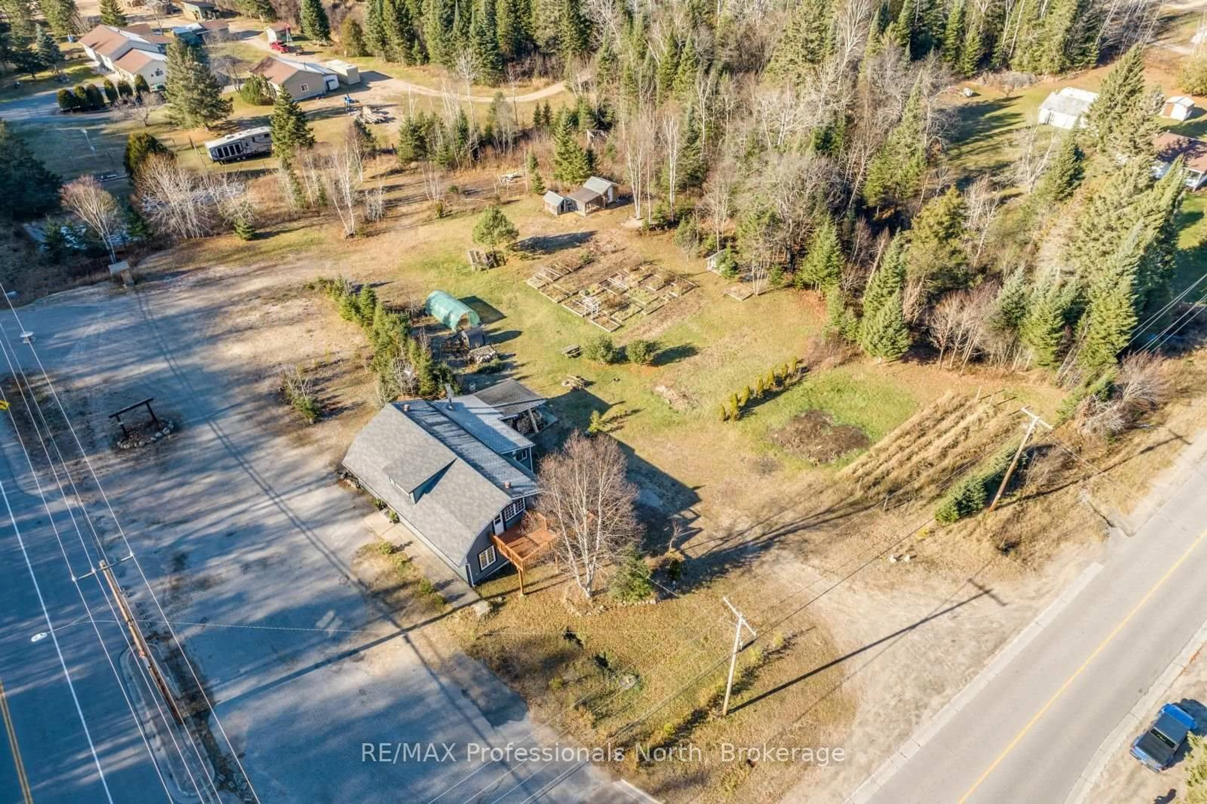 A pic from outside/outdoor area/front of a property/back of a property/a pic from drone, street for 4167 LOOP Rd, Dysart et al Ontario K0L 1X0