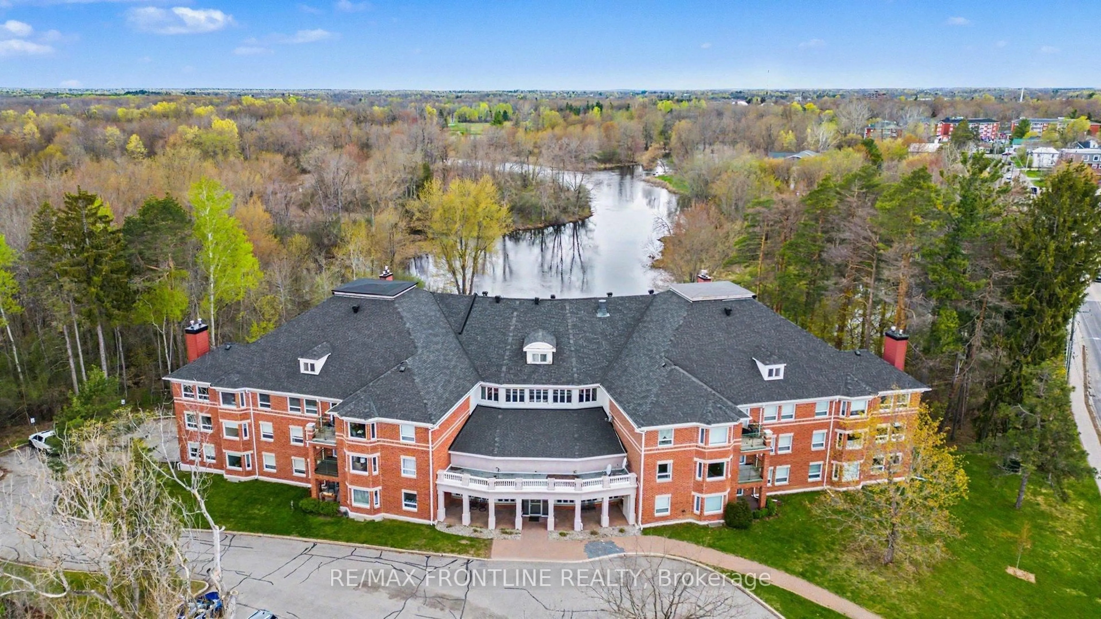 A pic from outside/outdoor area/front of a property/back of a property/a pic from drone, water/lake/river/ocean view for 23 Rogers Rd #209, Perth Ontario K7H 1P2