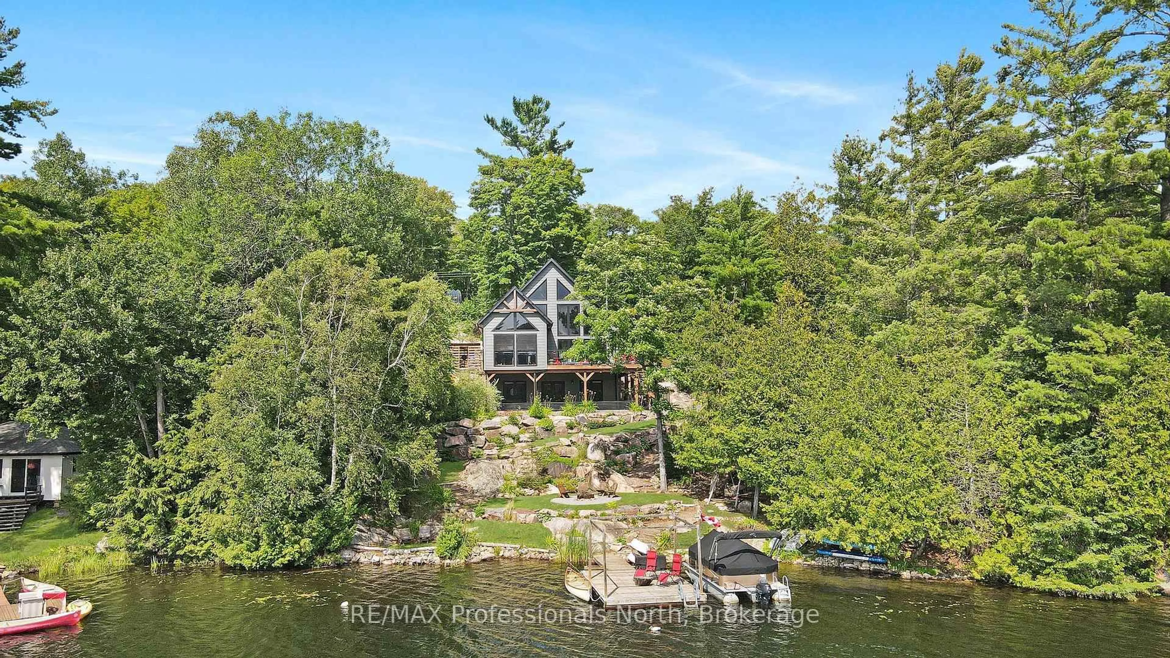 A pic from outside/outdoor area/front of a property/back of a property/a pic from drone, water/lake/river/ocean view for 1333 Nestle Tr, Highlands East Ontario K0M 1R0
