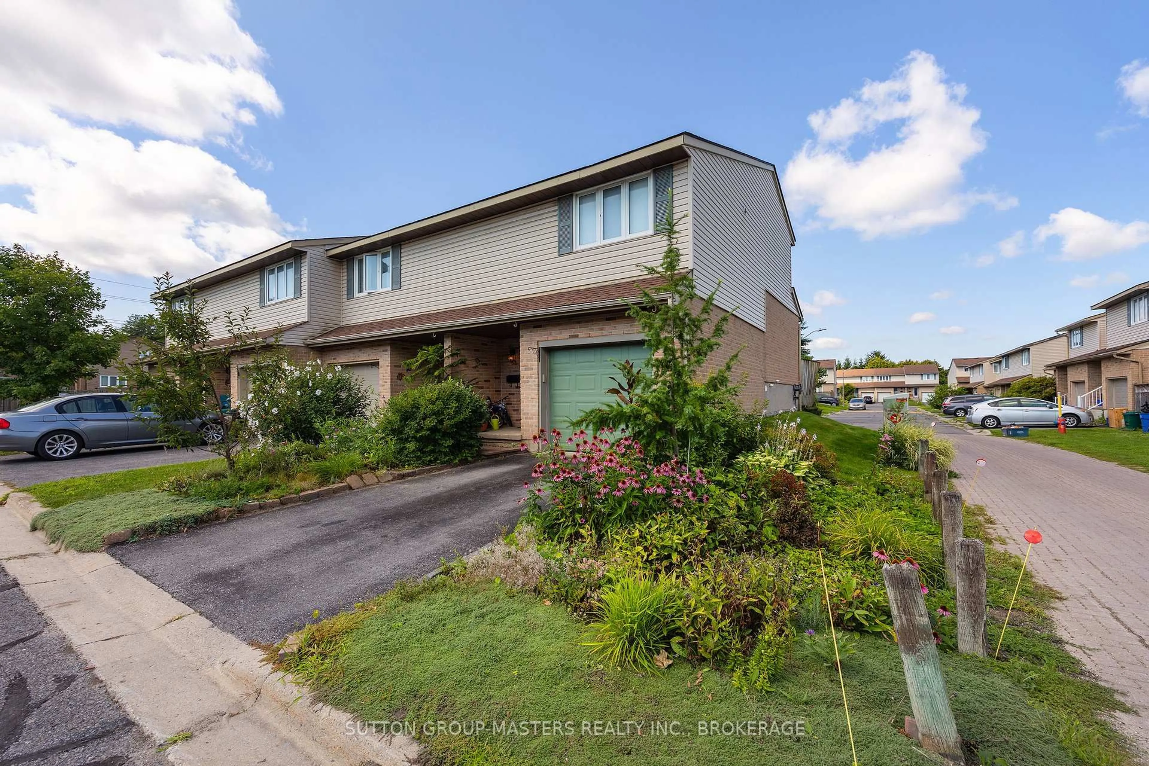 A pic from outside/outdoor area/front of a property/back of a property/a pic from drone, street for 52 Coventry Cres #34, Kingston Ontario K7M 7S7