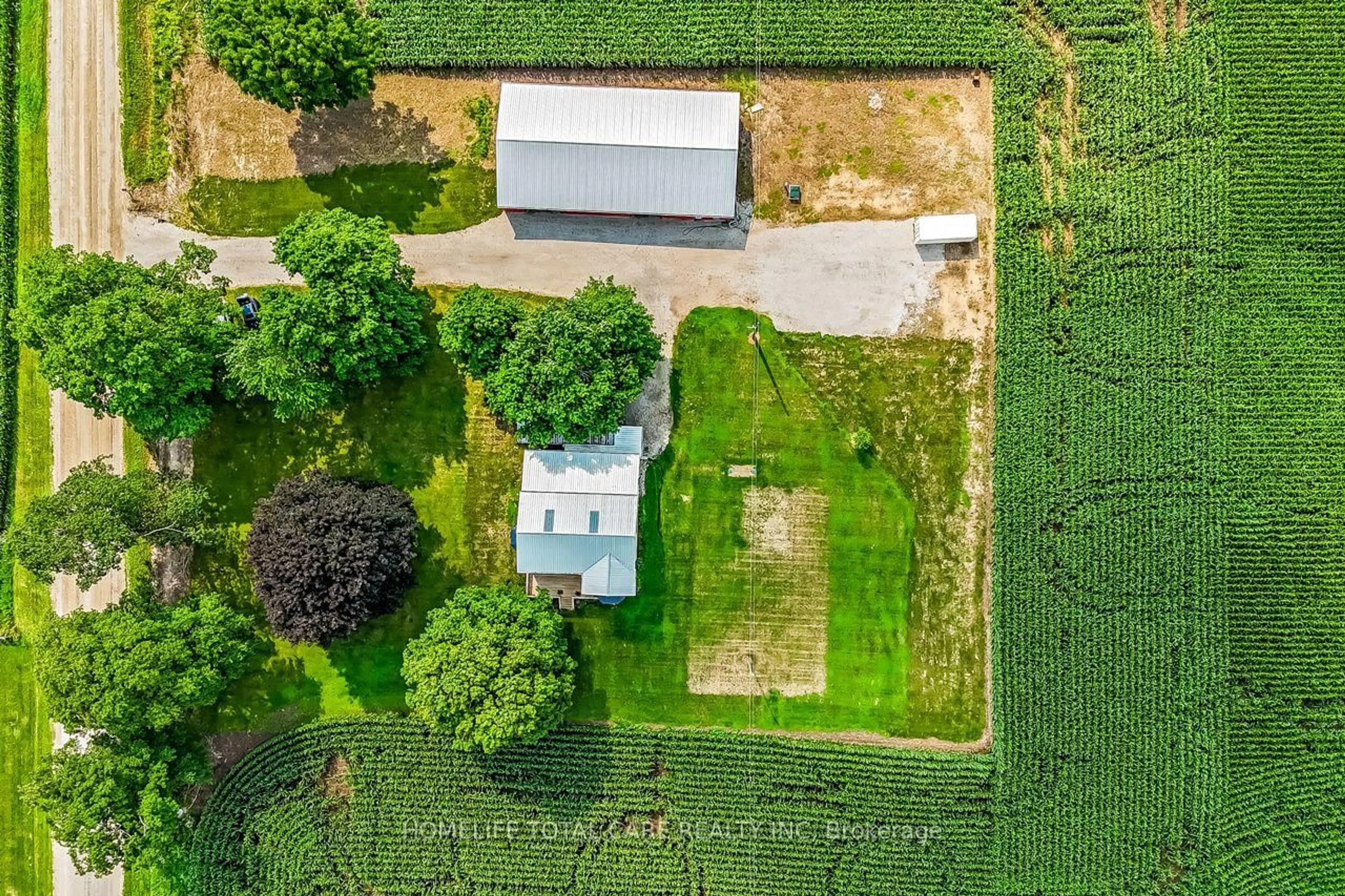 A pic from outside/outdoor area/front of a property/back of a property/a pic from drone, building for 4128 Mossley Dr, Thames Centre Ontario N0L 1V0