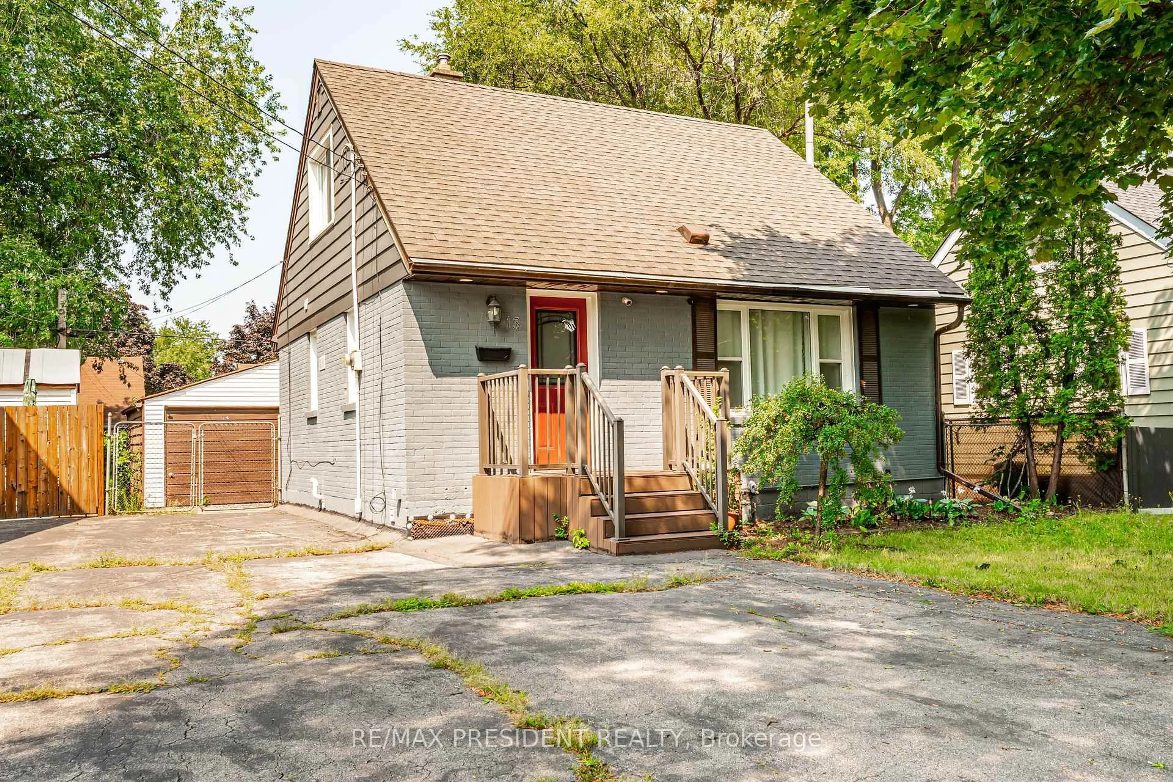 Home with vinyl exterior material, street for 13 Lewis St, Hamilton Ontario L8H 6C3