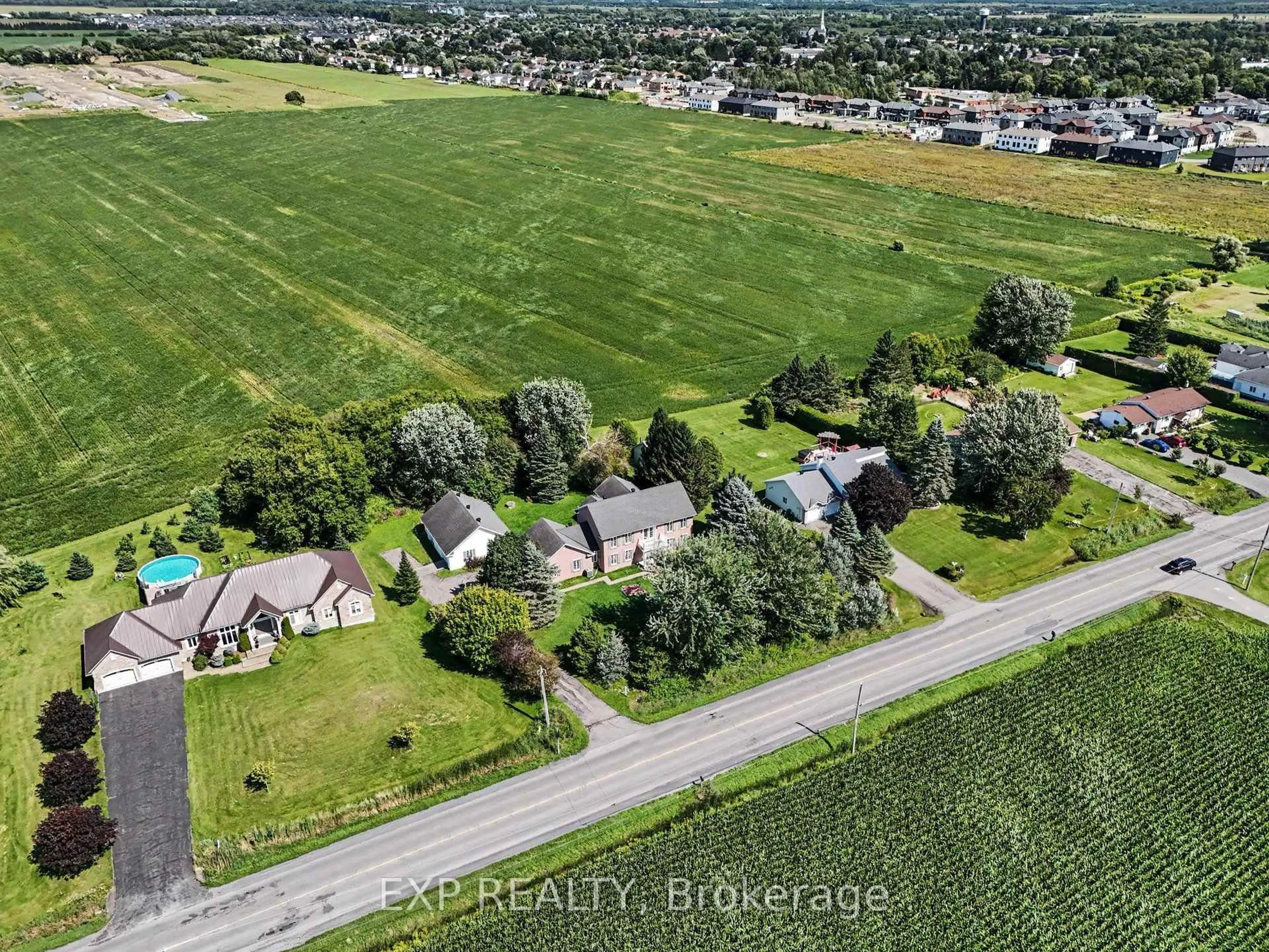 A pic from outside/outdoor area/front of a property/back of a property/a pic from drone, street for 1007 St Pierre Rd, Russell Ontario K0A 1W0