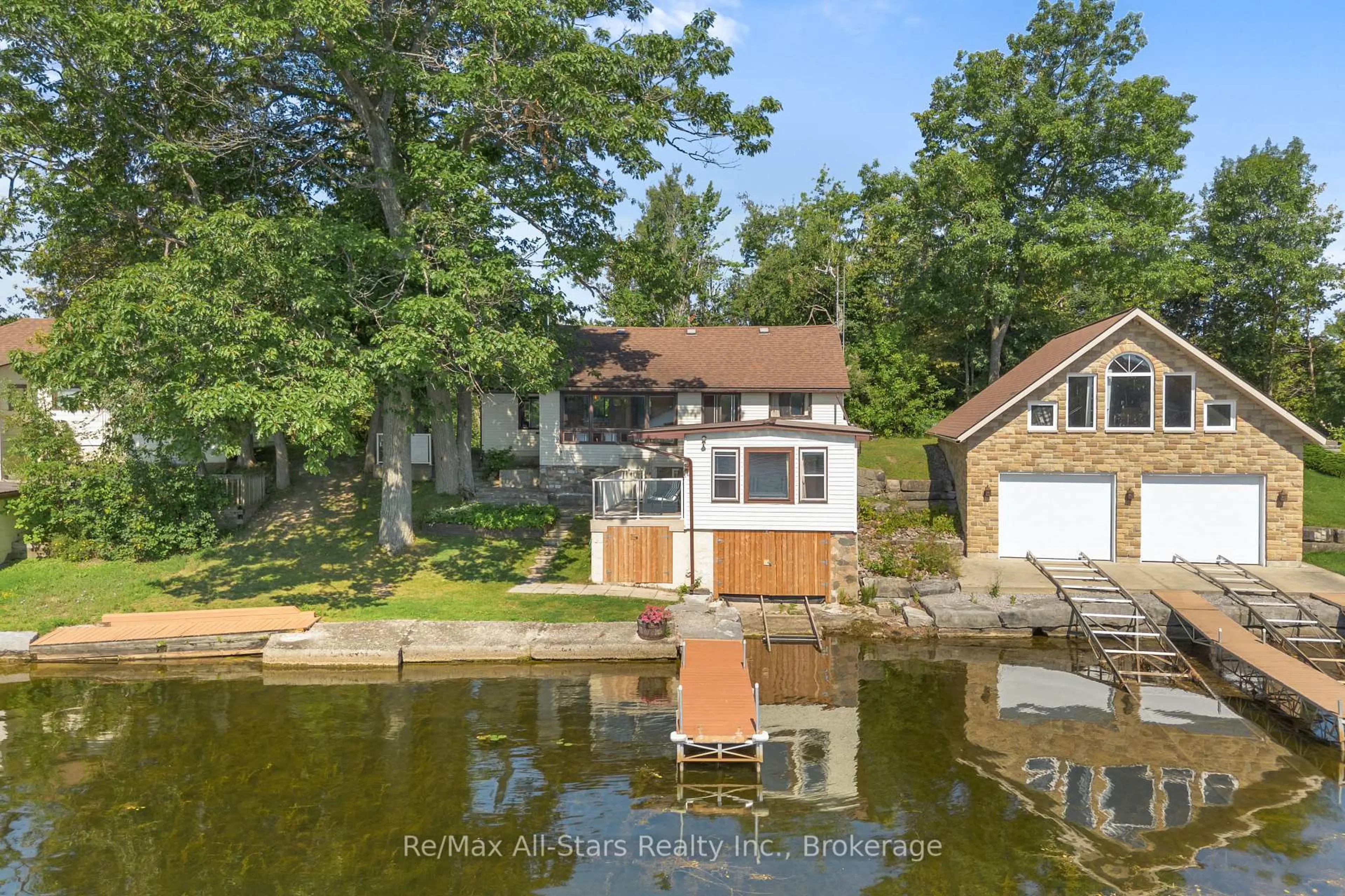 A pic from outside/outdoor area/front of a property/back of a property/a pic from drone, water/lake/river/ocean view for 75 Fells Point Rd, Kawartha Lakes Ontario K0M 1N0