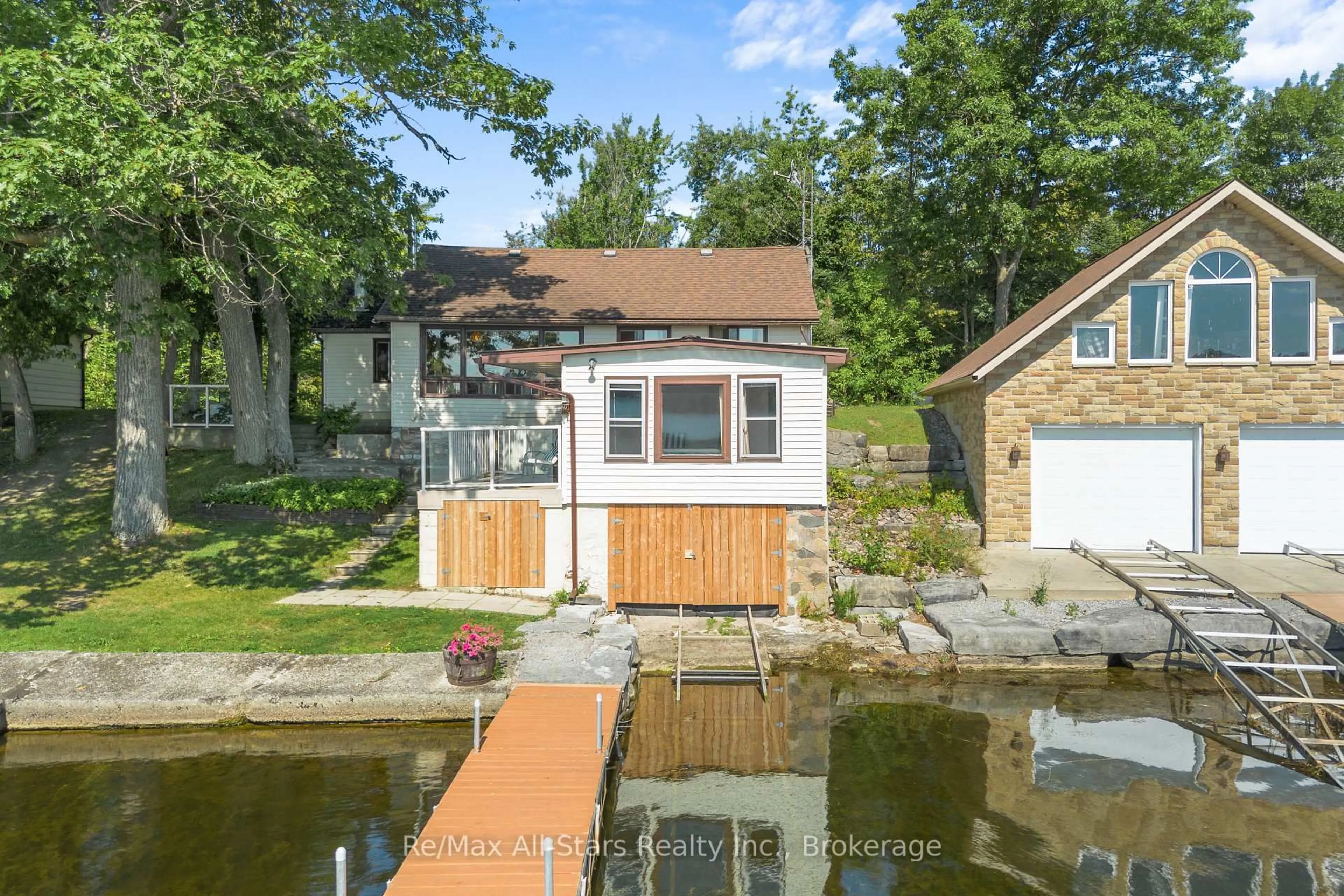 A pic from outside/outdoor area/front of a property/back of a property/a pic from drone, water/lake/river/ocean view for 75 Fells Point Rd, Kawartha Lakes Ontario K0M 1N0
