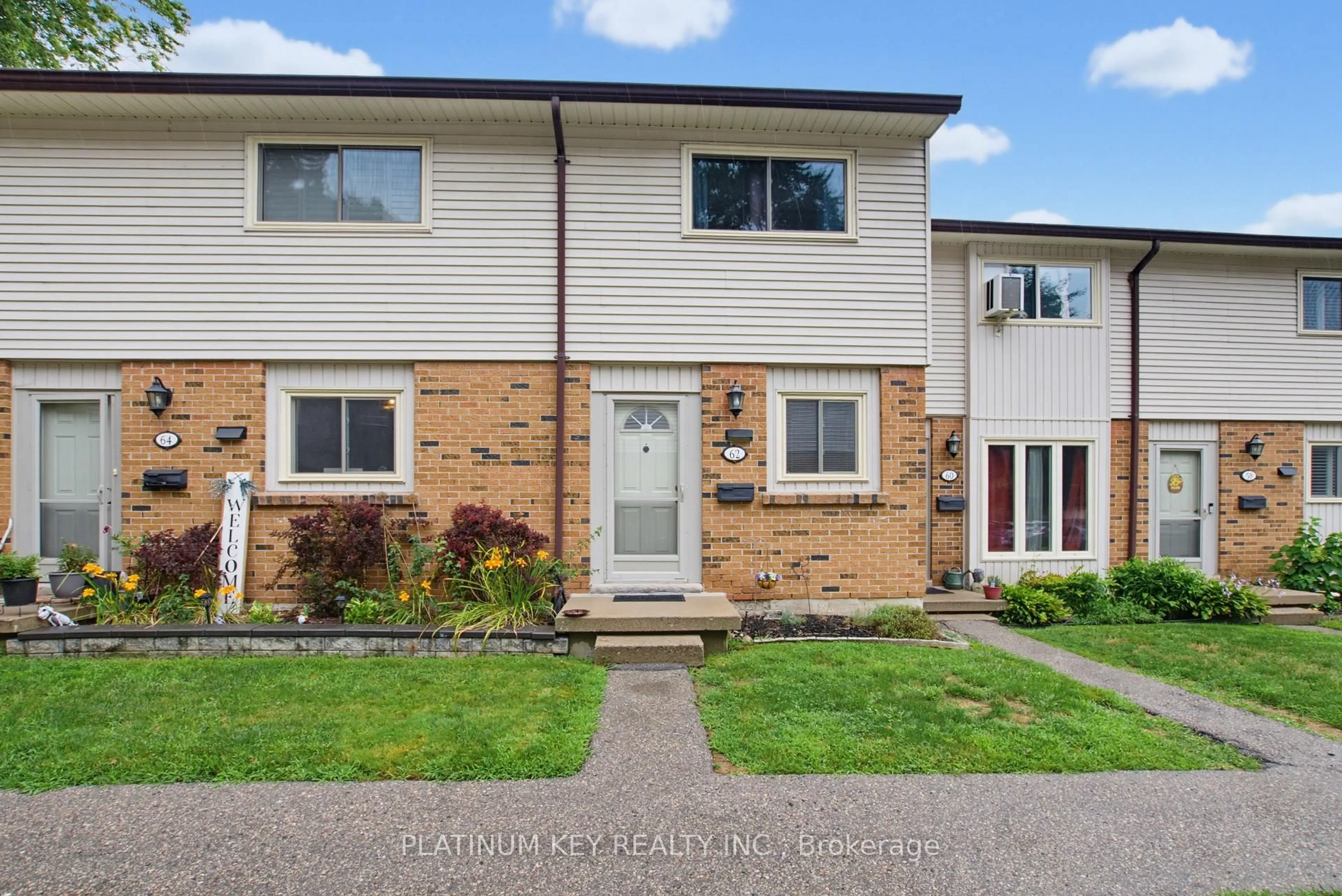 Home with brick exterior material, street for 1328 Commissioners Rd #62, London South Ontario N6K 2Y6