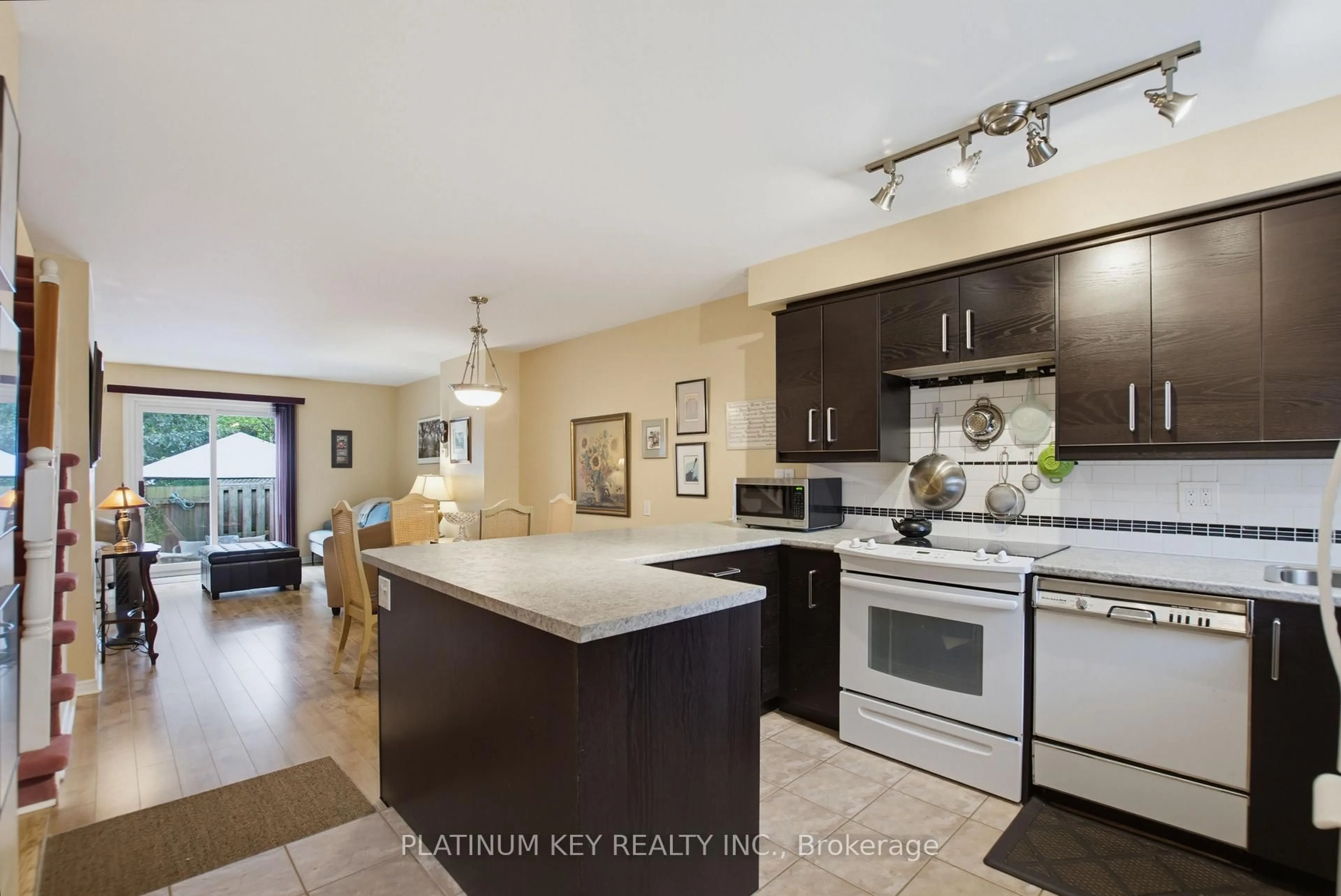 Open concept kitchen, ceramic/tile floor for 1328 Commissioners Rd #62, London South Ontario N6K 2Y6