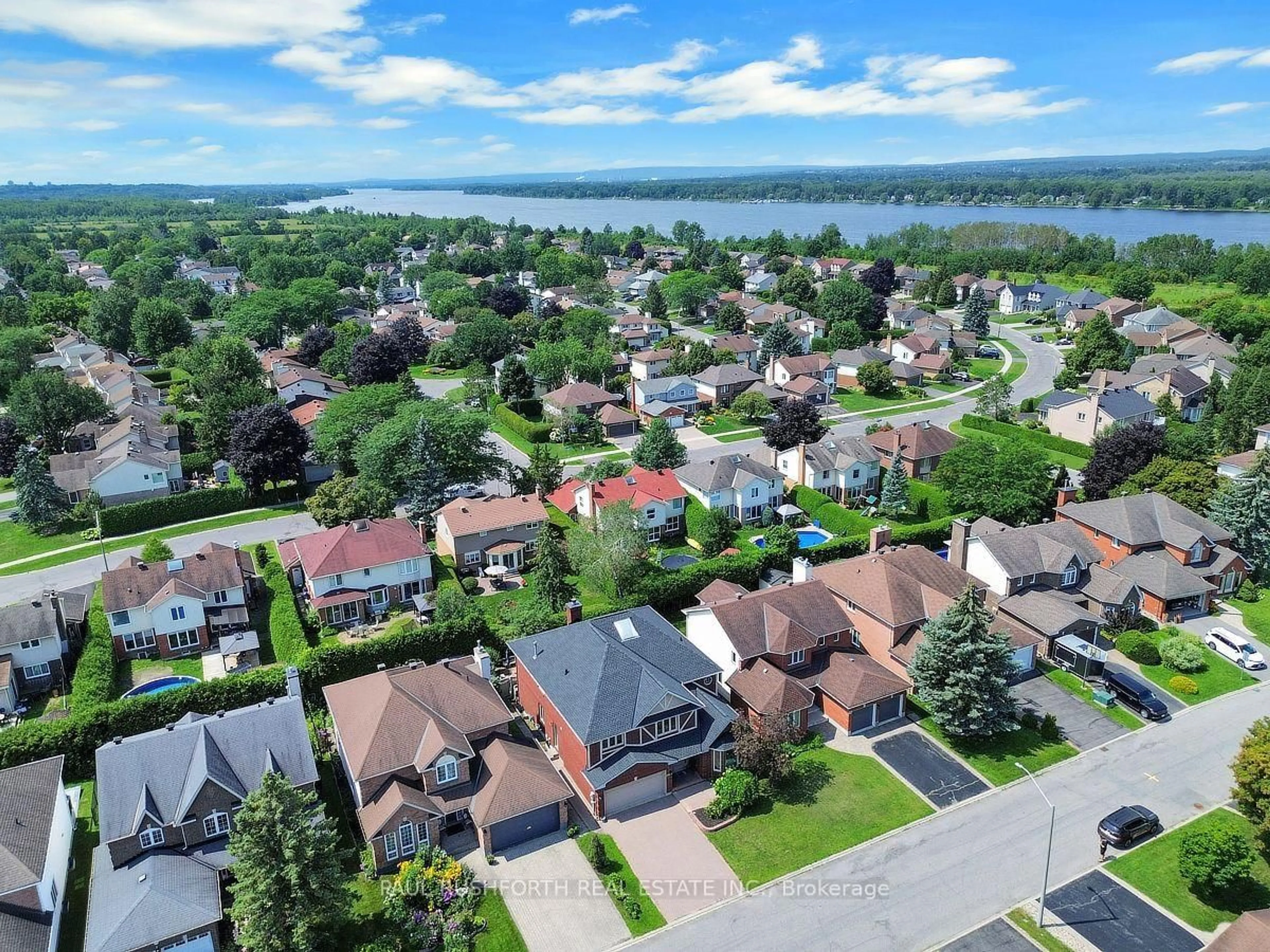A pic from outside/outdoor area/front of a property/back of a property/a pic from drone, water/lake/river/ocean view for 6192 Ravine Way, Orleans Ontario K1C 2W4