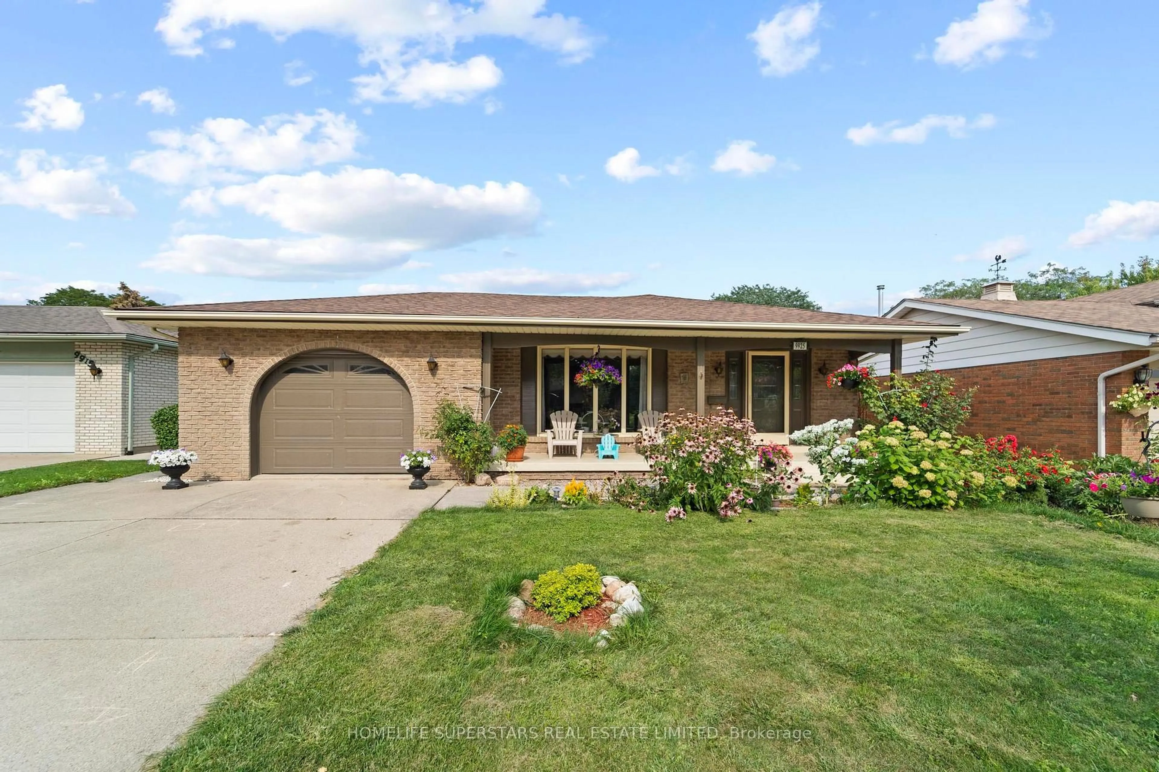 Home with brick exterior material, street for 9925 Holly Cres, Windsor Ontario N8R 1Y6