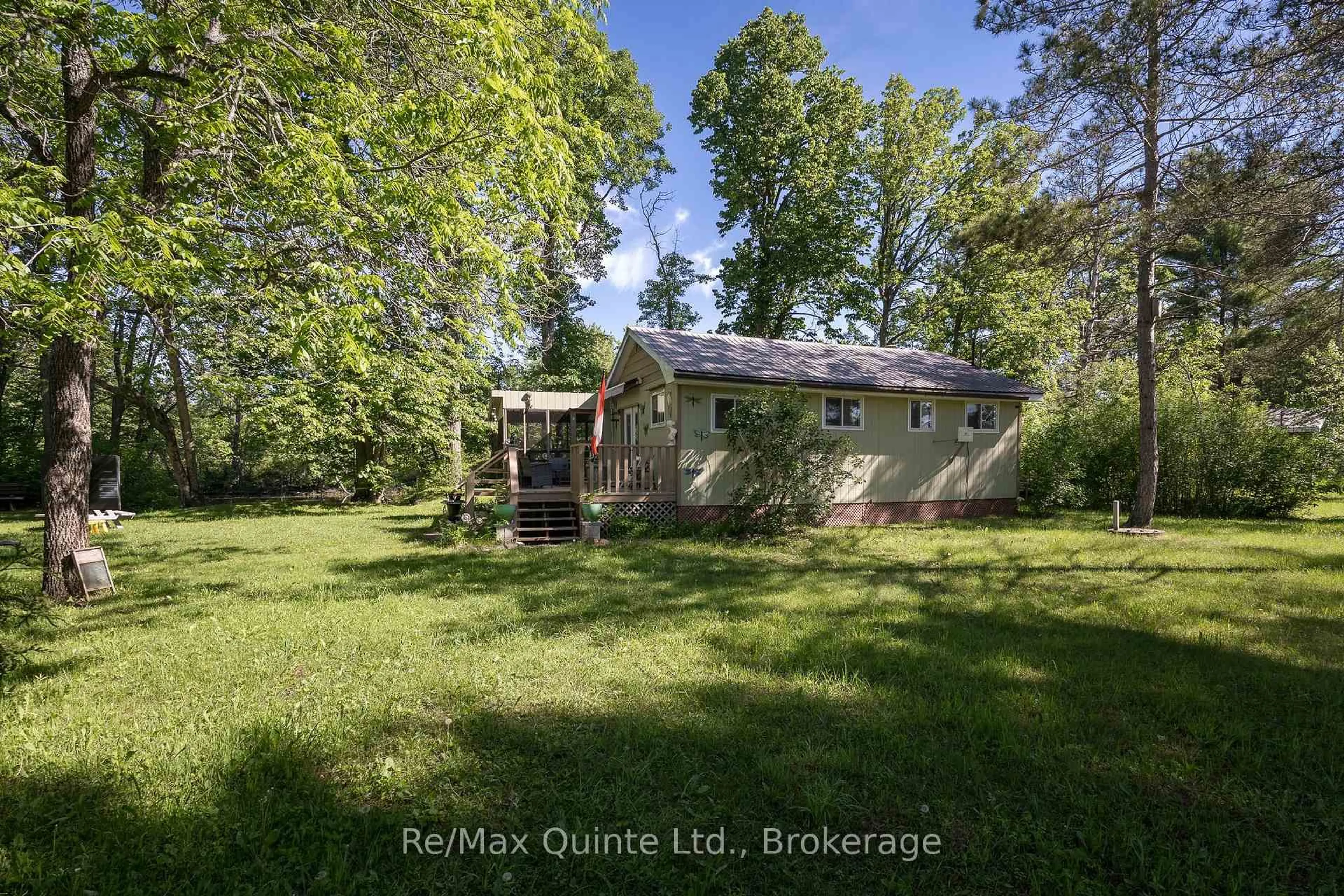 A pic from outside/outdoor area/front of a property/back of a property/a pic from drone, water/lake/river/ocean view for 74 French Settlement Lane, Tweed Ontario K0K 3J0