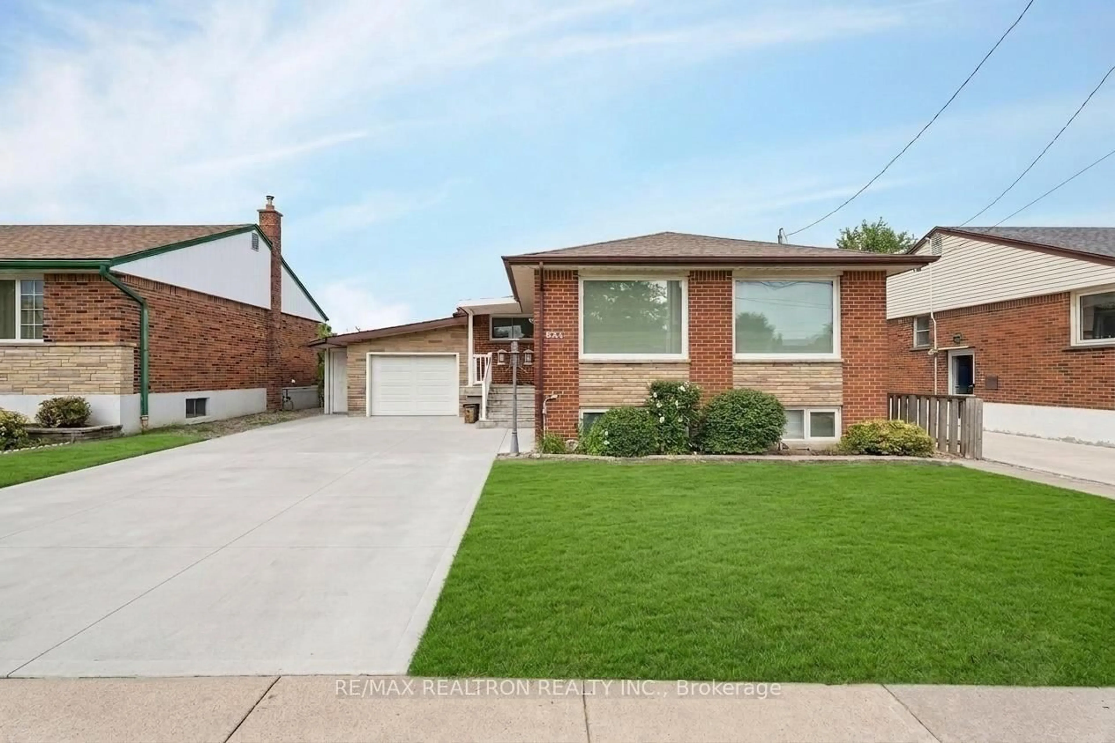 Home with brick exterior material, street for 831 Mohawk Rd, Hamilton Ontario L8T 2R4