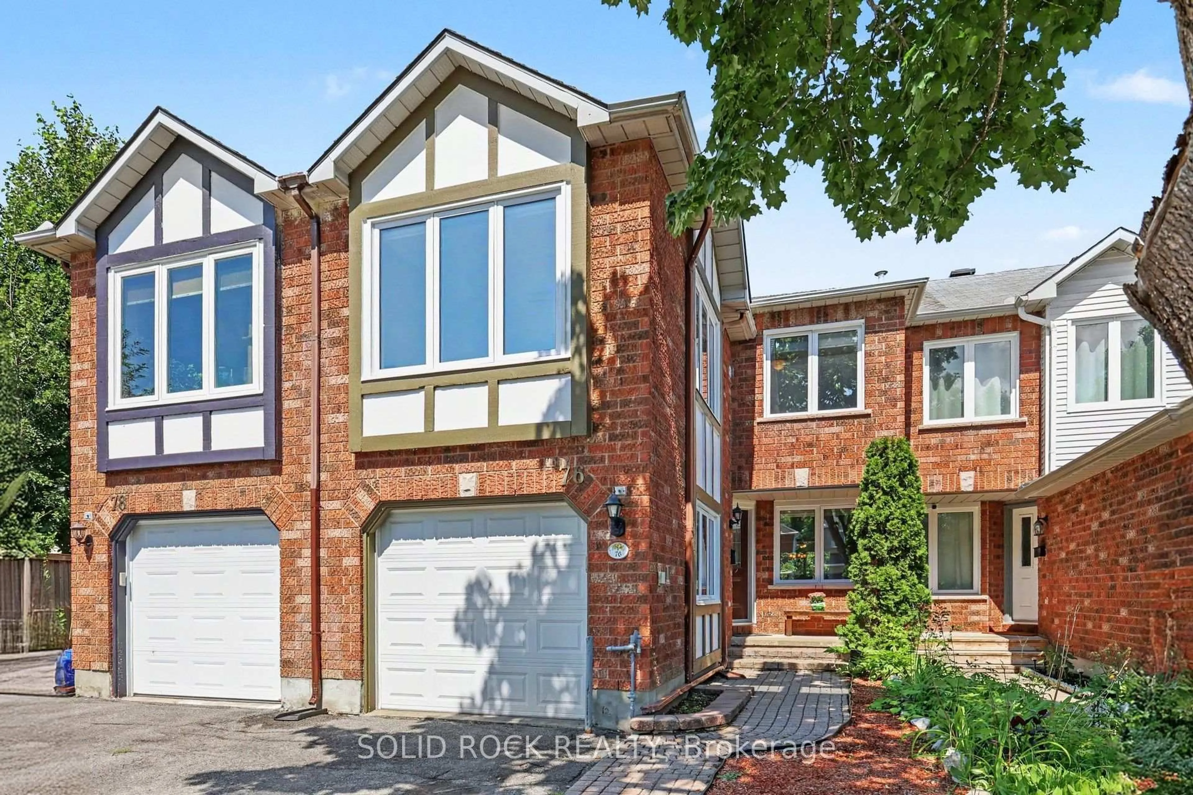 Home with brick exterior material, street for 76 Grenadier Way, Ottawa Ontario K2J 4L5
