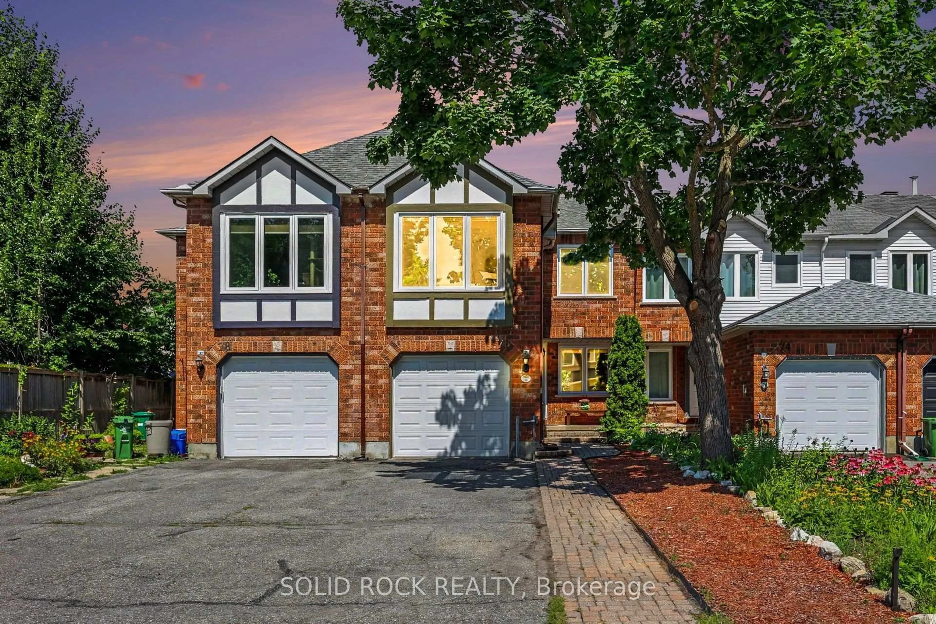 Home with brick exterior material, street for 76 Grenadier Way, Ottawa Ontario K2J 4L5