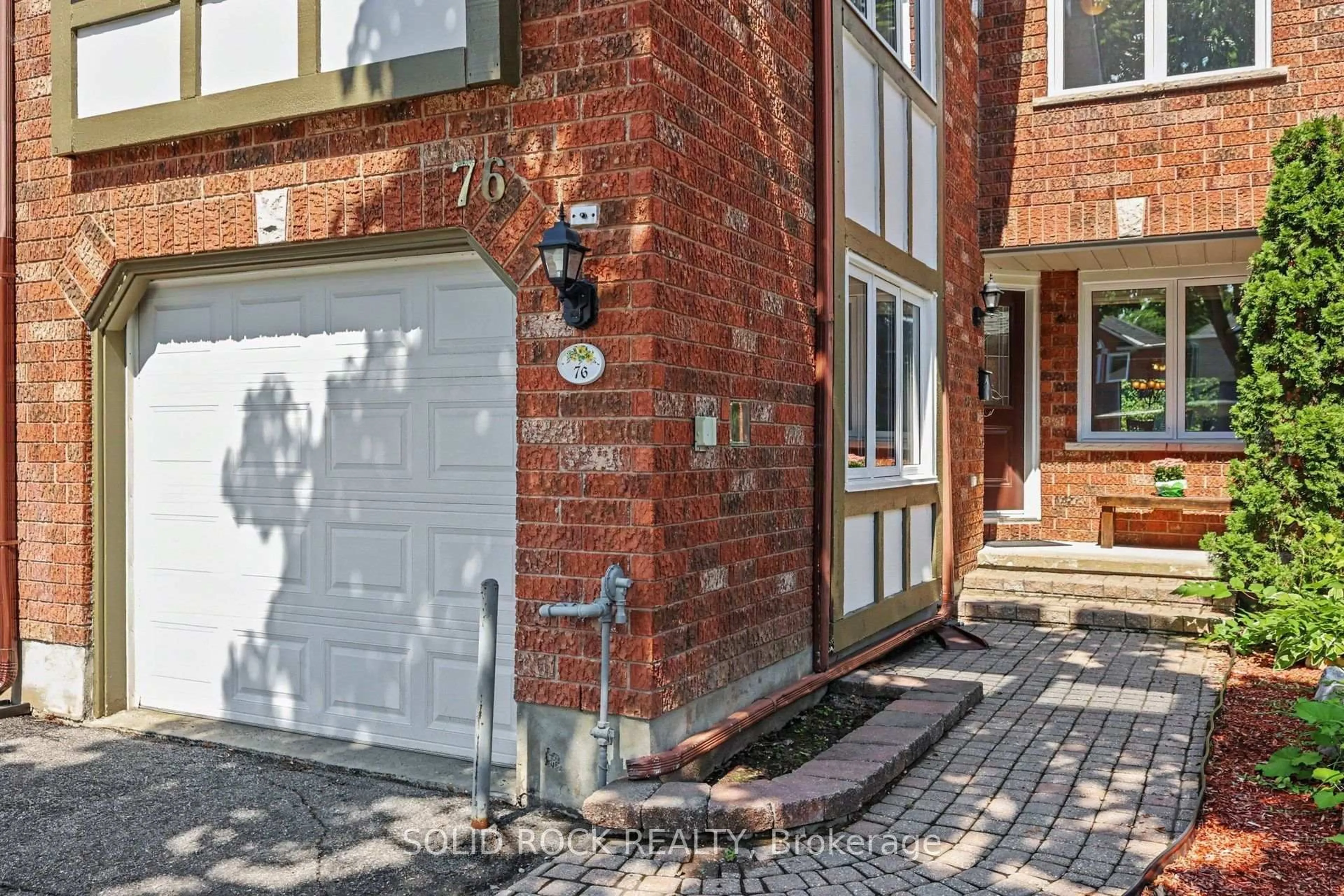 Home with brick exterior material, street for 76 Grenadier Way, Ottawa Ontario K2J 4L5